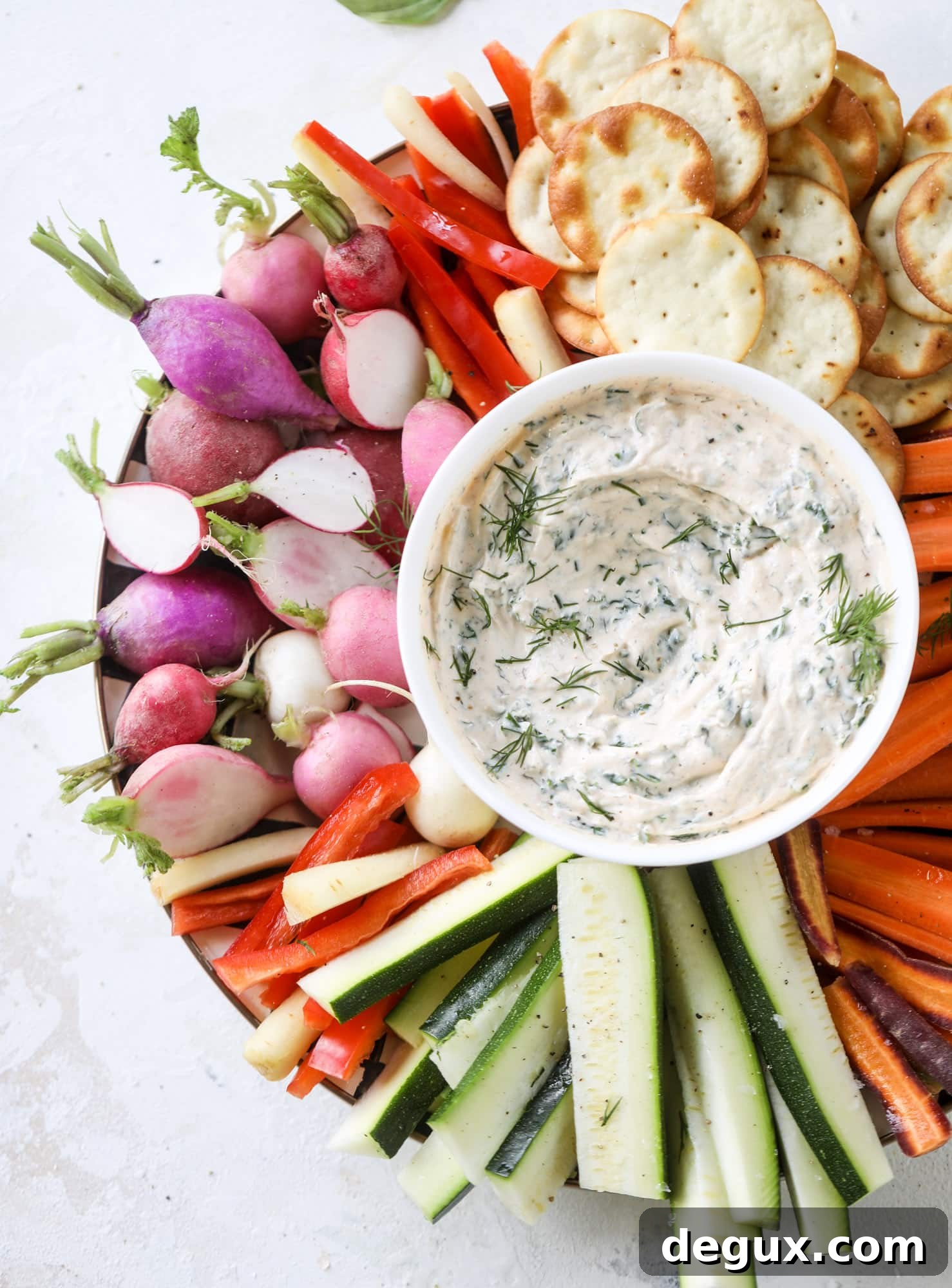 Smoky Cool Ranch Kale Dip Recipe — Tangy, Creamy Party Dip 8 This greek yogurt ranch dip is fabulous for a summertime pool tip and it's full of greens! Made with a homemade ranch spice seasoning, lots of shredded greek kale and greek yogurt, it's the perfect dip for crudite or chips! I howsweeteats.com #kale #greek #yogurt #ranch #dip #healthy #snacks