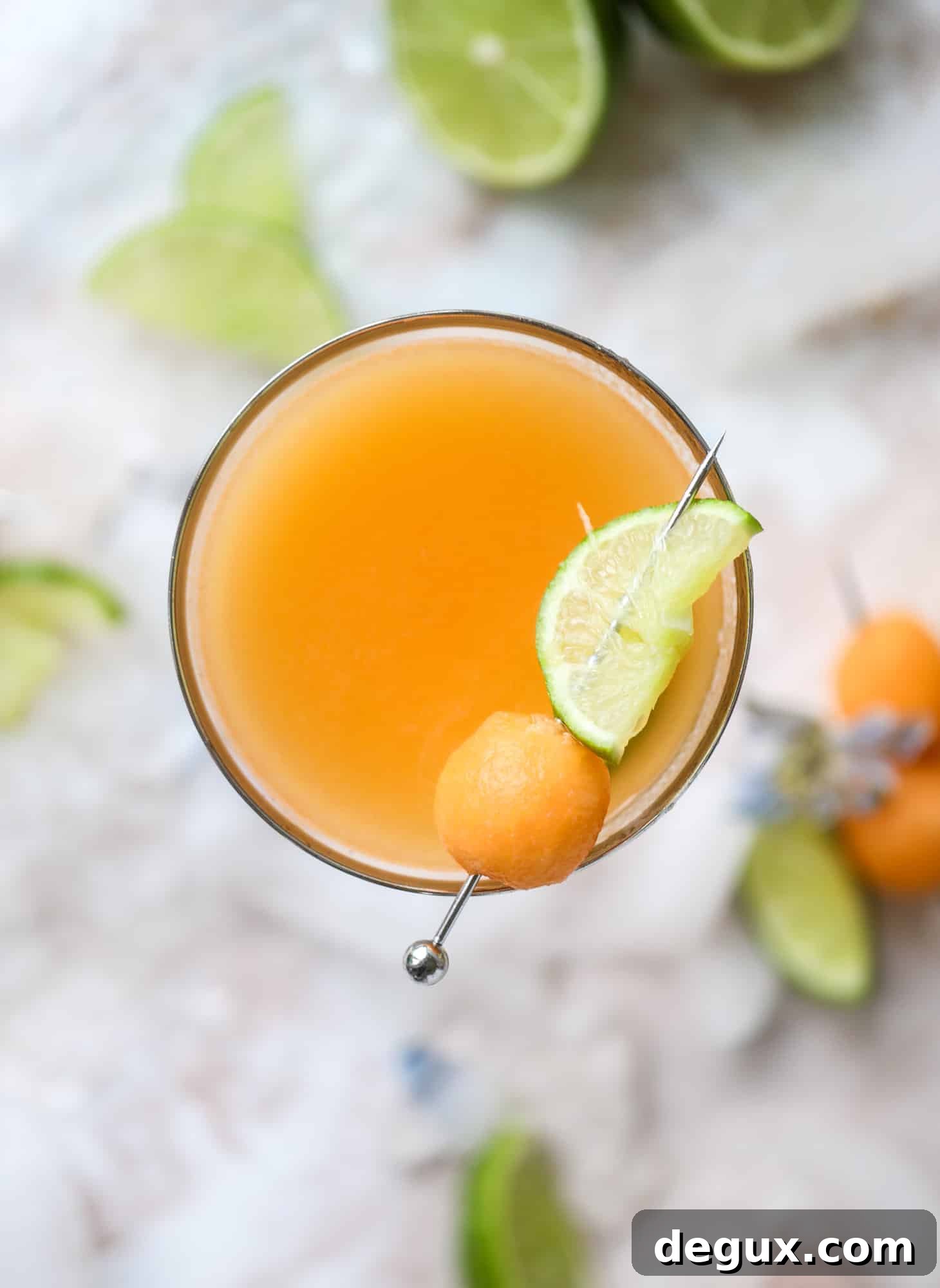 Cantaloupe Daiquiri Recipe: Fresh, Tropical Summer Cocktail 8 This cantaloupe daiquiri is the perfect way to celebrate summer! Freshly juiced melon, lime juice, rum and maraschino cherries - it's refreshing and cool and a fantastic cocktail to have during happy hour! Isn't the color amazing too?!
