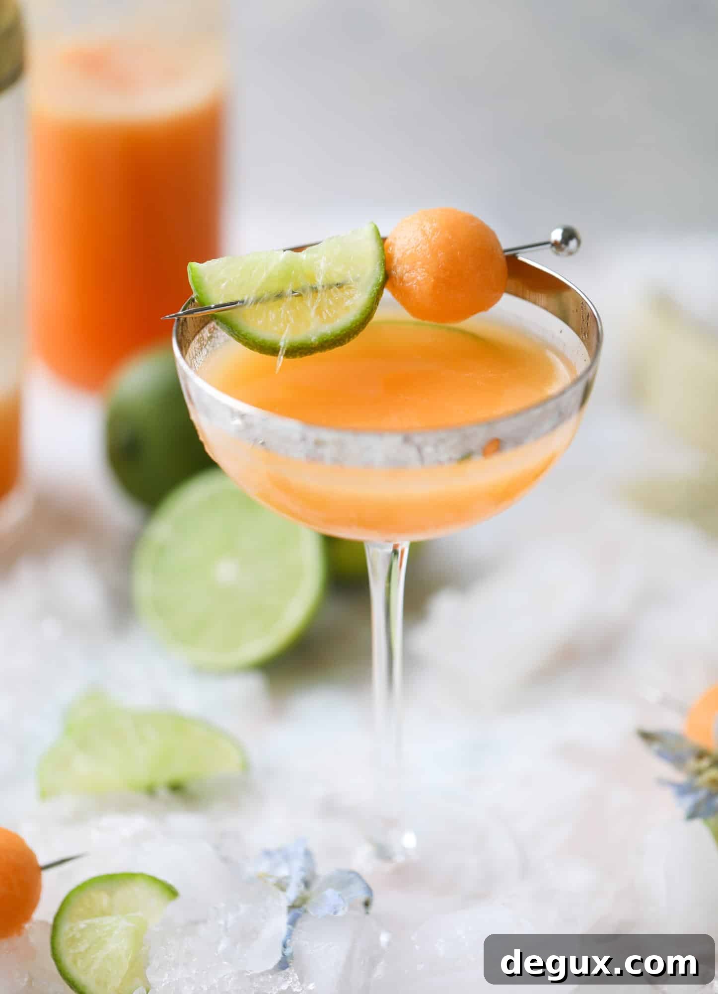 Cantaloupe Daiquiri Recipe: Fresh, Tropical Summer Cocktail 9 This cantaloupe daiquiri is the perfect way to celebrate summer! Freshly juiced melon, lime juice, rum and maraschino cherries - it's refreshing and cool and a fantastic cocktail to have during happy hour! Isn't the color amazing too?!