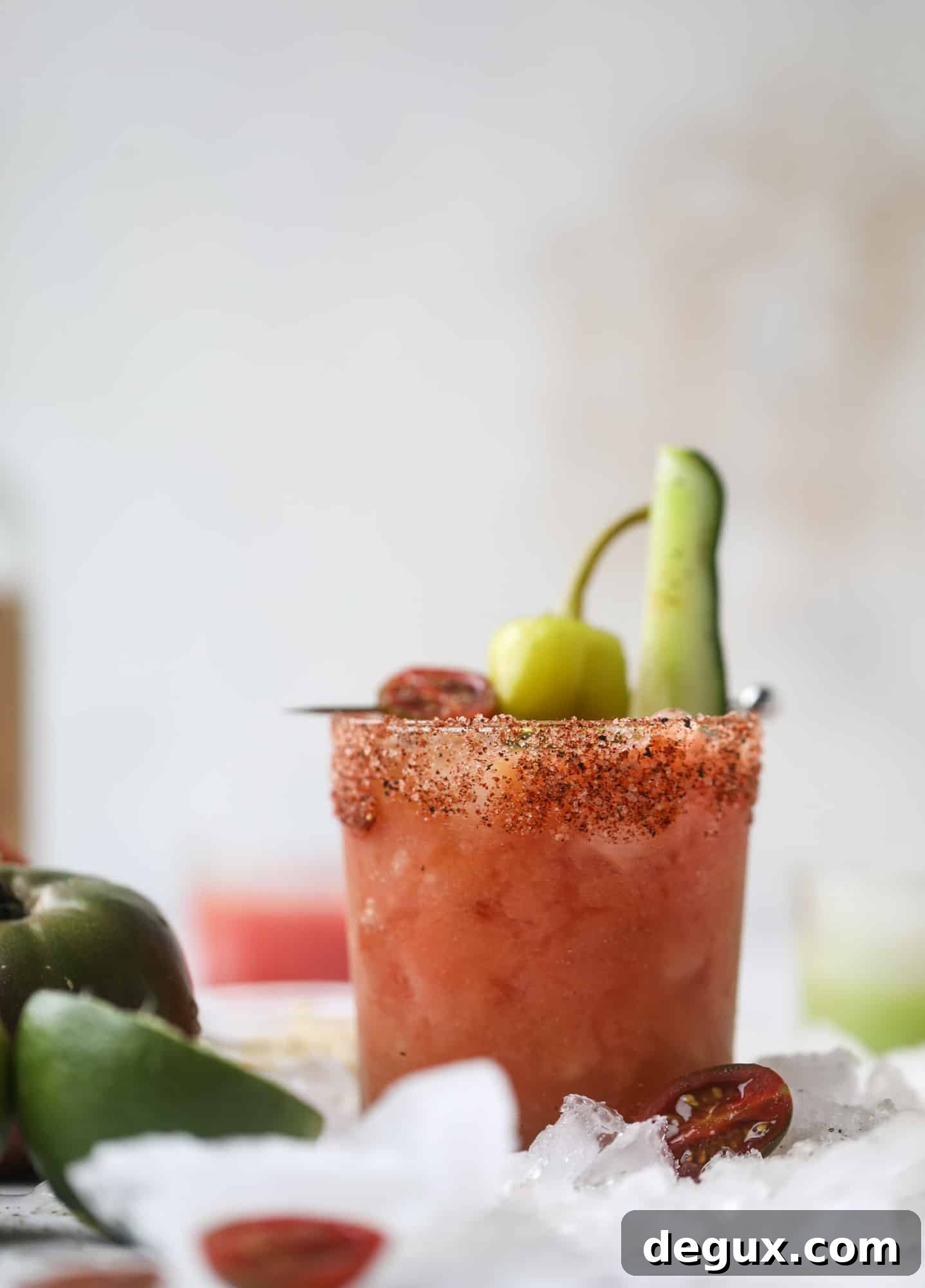 Heirloom Tomato Bloody Mary Recipe with Fresh Garden Flavor 7 This bloody mary recipe is made with fresh heirloom tomatoes - the gems of summer! The colors swirl together to create a stunning drinking that is loaded with smoky, spicy flavor. Top with your favorite snacks foe the perfect brunch! I howsweeteats.com #bloody #mary #recipe #best #heirloom #tomatoes #cocktail