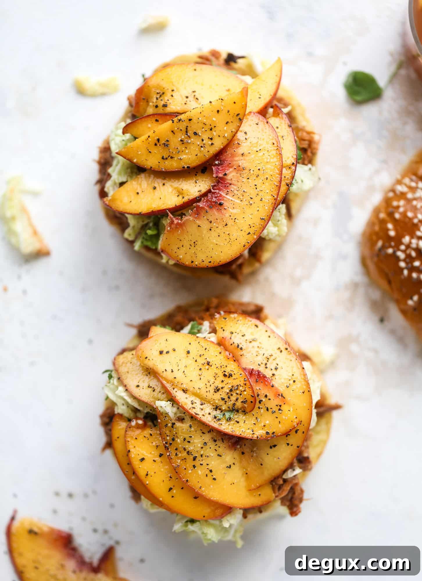 Chipotle Pulled Pork with Tangy Pickled Peaches Recipe 4 This chipotle pulled pork sandwich is spicy, sweet and saucy. Throw it on a bun or a plate and top it with the most delicious quick pickled peaches and napa cabbage slaw. Flavor and texture make this sandwich incredible! I howsweeteats.com #pulled #pork #chipotle #pickled #peaches #slaw #sandwiches #slow #cooker
