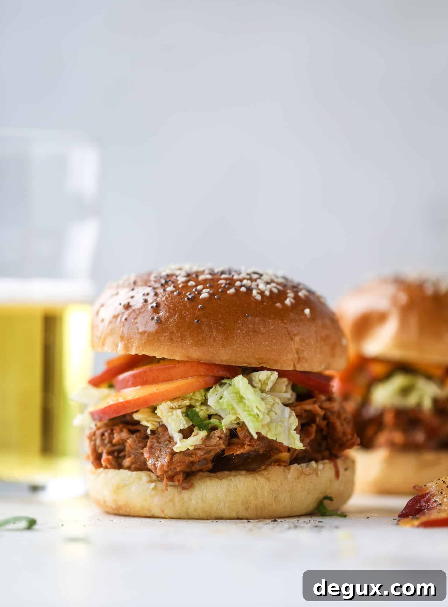 Chipotle Pulled Pork with Tangy Pickled Peaches Recipe 7 This chipotle pulled pork sandwich is spicy, sweet and saucy. Throw it on a bun or a plate and top it with the most delicious quick pickled peaches and napa cabbage slaw. Flavor and texture make this sandwich incredible! I howsweeteats.com #pulled #pork #chipotle #pickled #peaches #slaw #sandwiches #slow #cooker