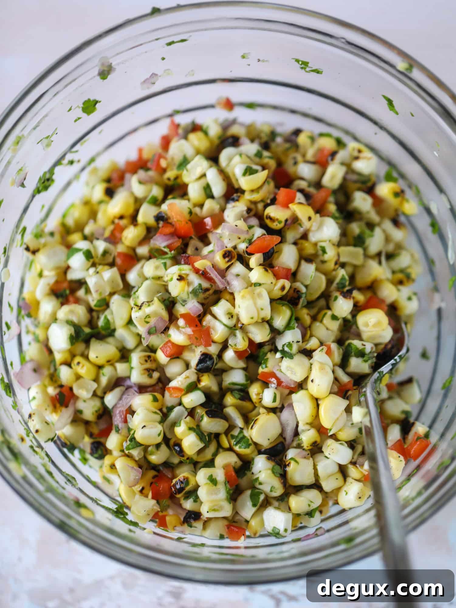 This skirt steak recipe is so super easy and delicious! Marinate it for a bit, prepare it to your liking then serve it with the most flavorful avocado pesto and grilled corn relish. Feels like a fancy restaurant meal and will make you love skirt steak forever! I howsweeteats.com #skirt #steak #avocado #pesto #corn #relish #recipes