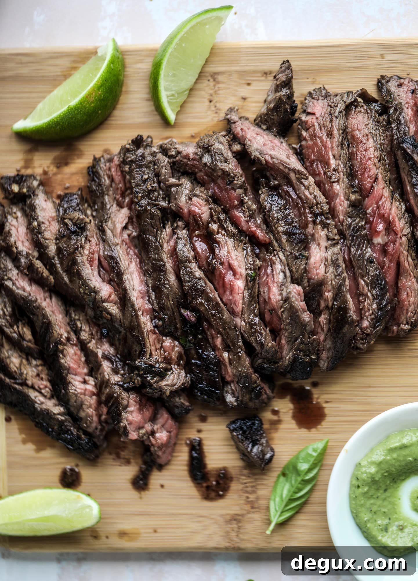 This skirt steak recipe is so super easy and delicious! Marinate it for a bit, prepare it to your liking then serve it with the most flavorful avocado pesto and grilled corn relish. Feels like a fancy restaurant meal and will make you love skirt steak forever! I howsweeteats.com #skirt #steak #avocado #pesto #corn #relish #recipes