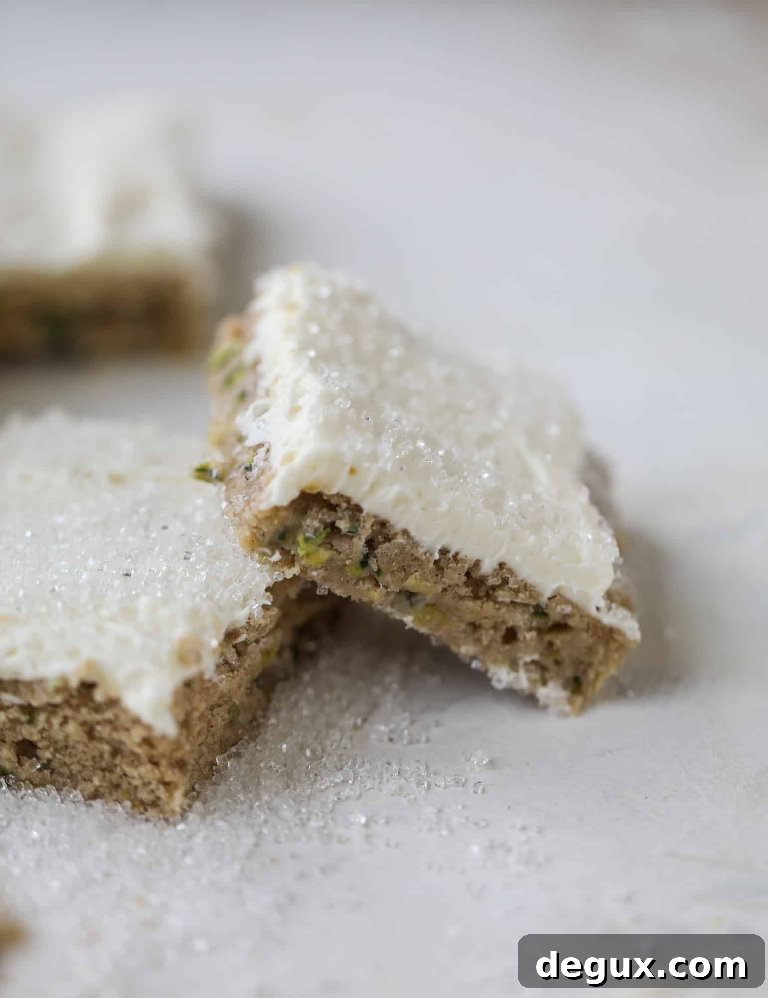 Zucchini Bars with Cream Cheese Frosting — Moist Spring Dessert 9 These zucchini bars with cream cheese icing are a fun twist on zucchini bread! Zucchini bars are super easy to make, have a little spice and a lot of flavor, topped with the creamiest cream cheese frosting. Delicious and simple! I howsweeteats.com #zucchini #bars #cream #cheese #icing #dessert