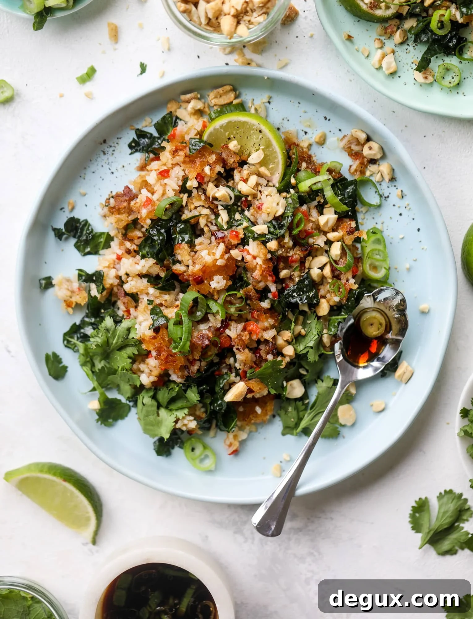 This crispy rice salad is the best lunch I've had in ages! It's full of crunch and crisp, it's satisfying and has lots of green kale so we get our veg in. The crispy rice salad can be a meal, you can add beans or rice or it can even be a side dish. I howsweeteats.com #rice #salad #vegetarian #crispy #kale