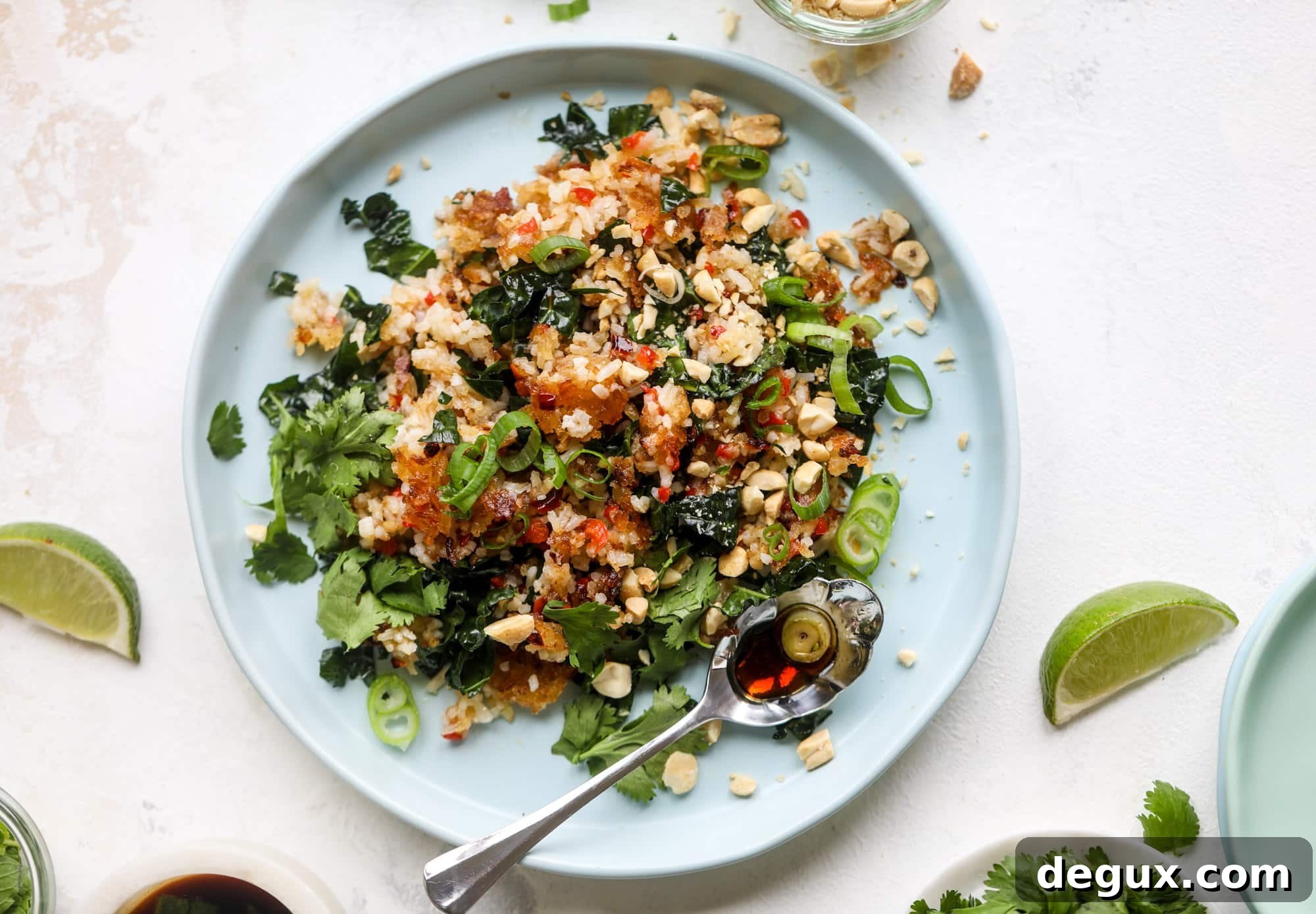 This crispy rice salad is the best lunch I've had in ages! It's full of crunch and crisp, it's satisfying and has lots of green kale so we get our veg in. The crispy rice salad can be a meal, you can add beans or rice or it can even be a side dish. I howsweeteats.com #rice #salad #vegetarian #crispy #kale