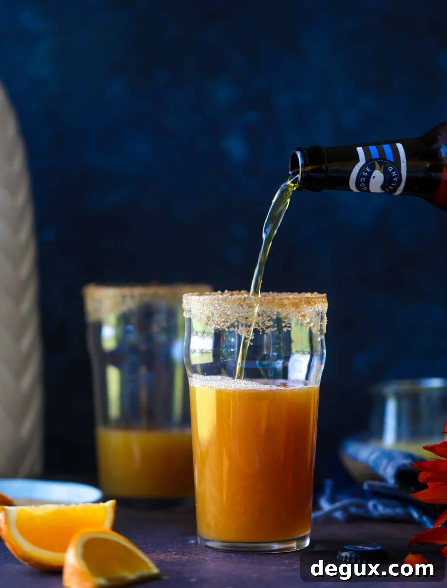 This apple cider shandy recipes is perfect for the fall season! Apple cider, sparkling cider and your favorite beer come together in an icy glass to create the best flavor ever. Finished with a cinnamon sugar rim, there's nothing better! I howsweeteats.com #apple #cider #shandy #cocktails #beer