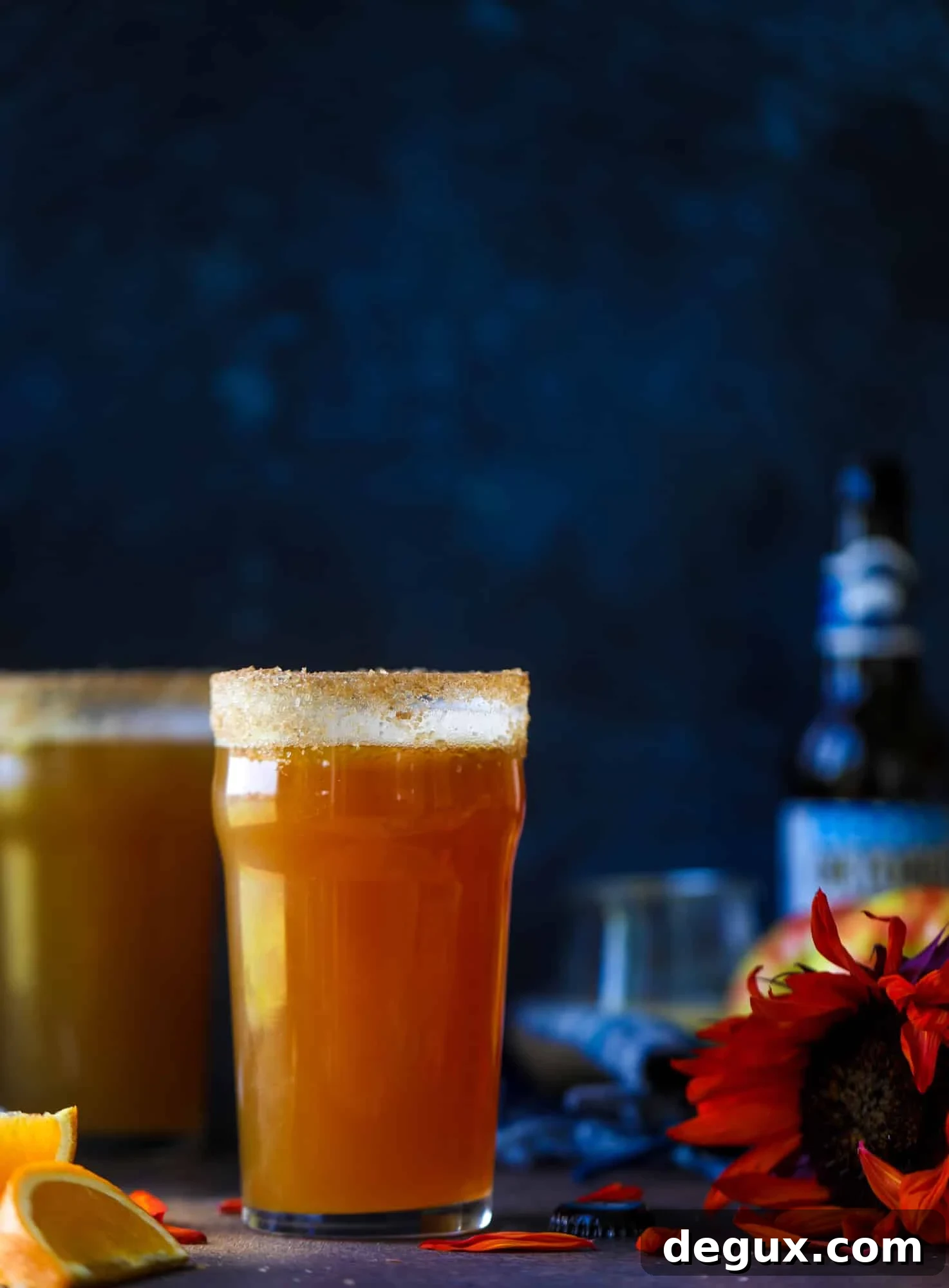 This apple cider shandy recipes is perfect for the fall season! Apple cider, sparkling cider and your favorite beer come together in an icy glass to create the best flavor ever. Finished with a cinnamon sugar rim, there's nothing better! I howsweeteats.com #apple #cider #shandy #cocktails #beer
