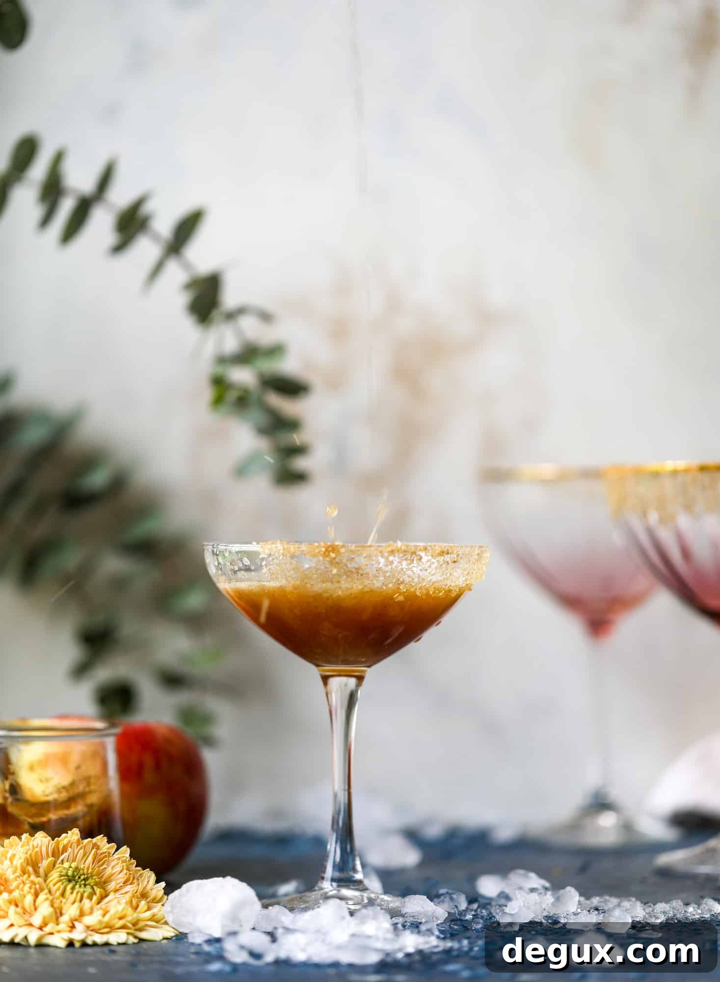 Autumn Apple Bourbon Fizz Cocktail Recipe 5 This apple butter cocktail is perfect for the fall season and incredibly delicious! It's super simple too: you need apple butter, bourbon and ginger ale or ginger beer. A cinnamon sugar rim and a fig garnish make it super pretty. YUM.