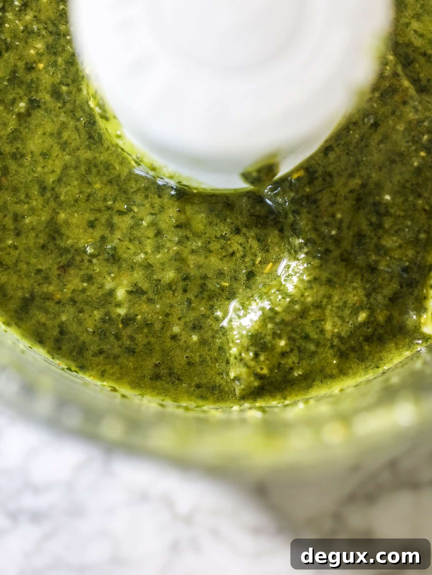 Ricotta jam jar appetizer with pesto and tomato jam
