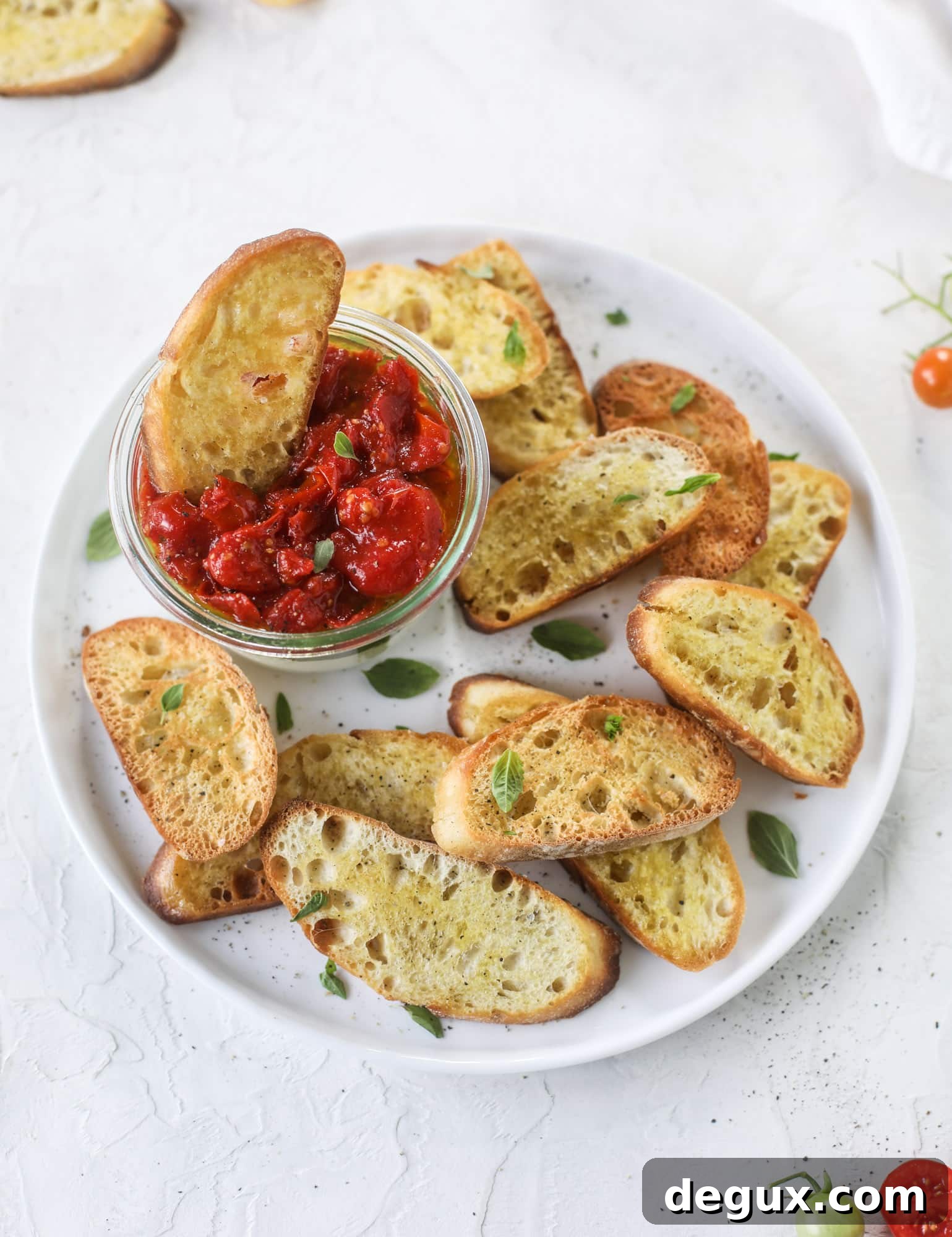 Jarred ricotta with pesto and tomato jam