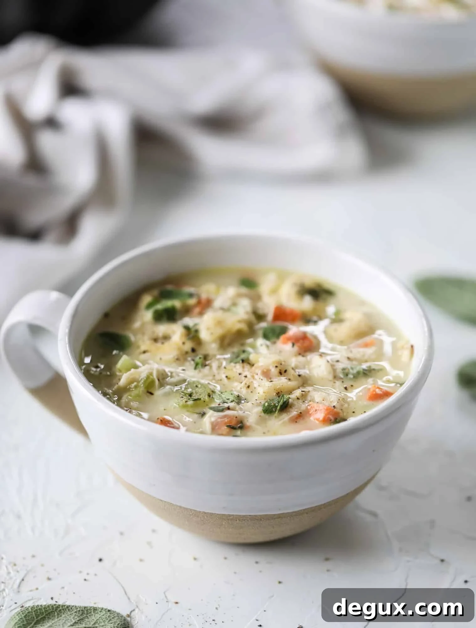 This creamy chicken tortellini soup is the perfect weeknight meal! It comes together quickly and is a great meal to use up a rotisserie chicken. It's satisfying and hearty, with tortellini replacing egg noodles for the pasta. Comfort food perfection! I howsweeteats.com #chicken #soup