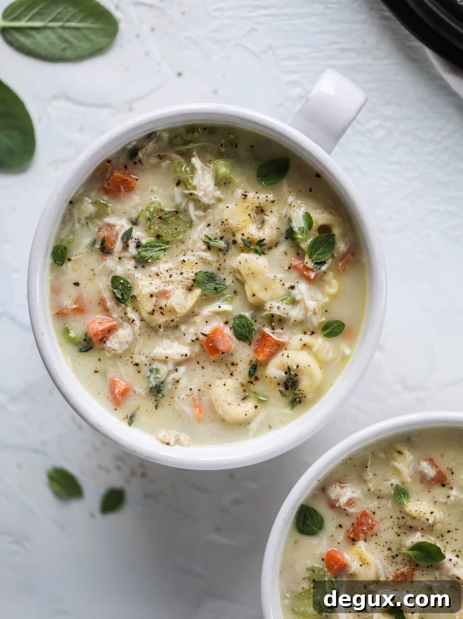 This creamy chicken tortellini soup is the perfect weeknight meal! It comes together quickly and is a great meal to use up a rotisserie chicken. It's satisfying and hearty, with tortellini replacing egg noodles for the pasta. Comfort food perfection! I howsweeteats.com #chicken #soup