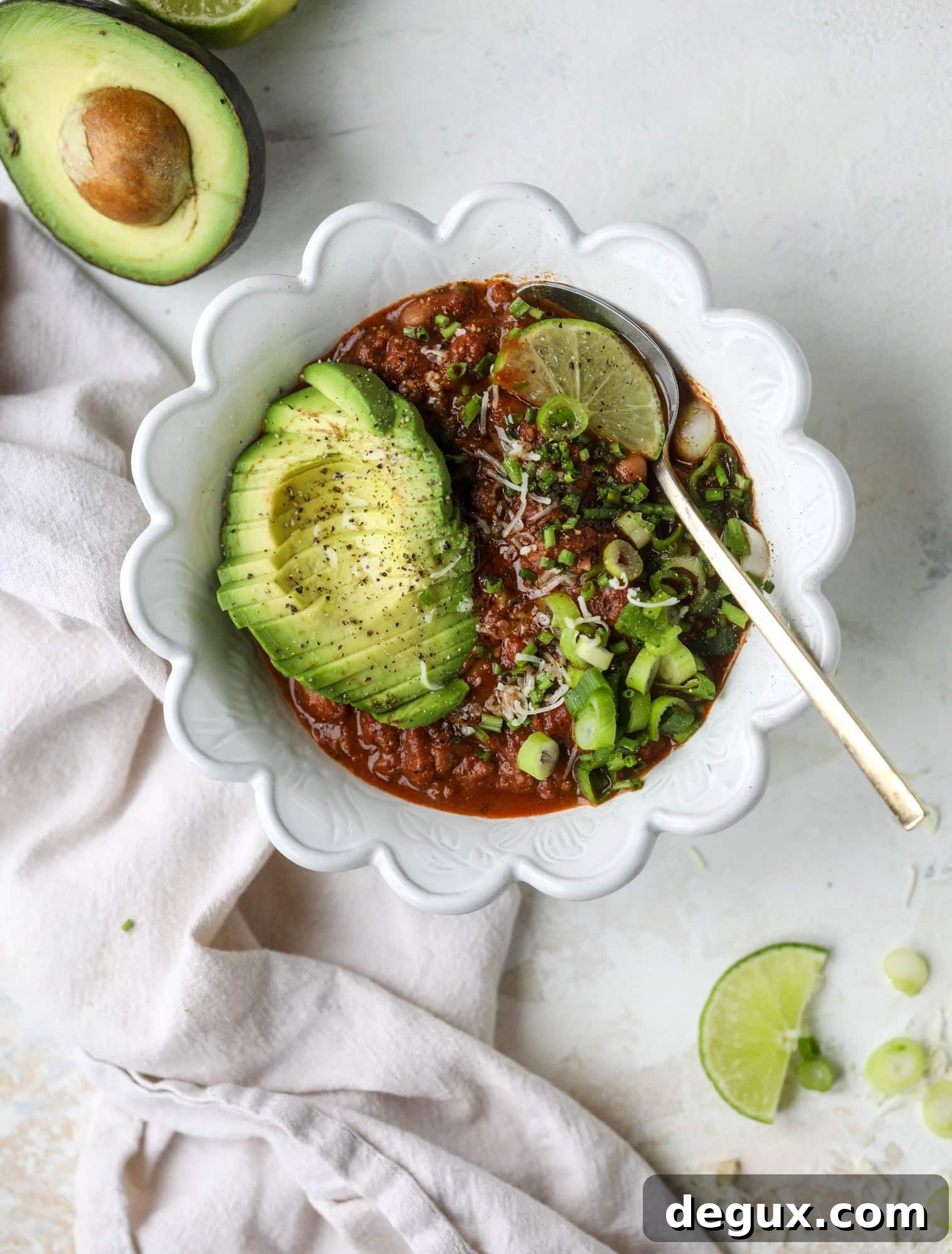 Fire and Ice Chili Recipe: Spicy-Sweet Chili with Cooling Yogurt 6 This fire and ice chili has a secret ingredient that makes it rich, velvety and insanely delicious. Dark chocolate ice cream is stirred in before serving and adds a crazy depth of flavor while bringing so much richness to your favorite bowl. You have to try it! I howsweeteats.com #chili #recipe #ice #cream #chili #bar