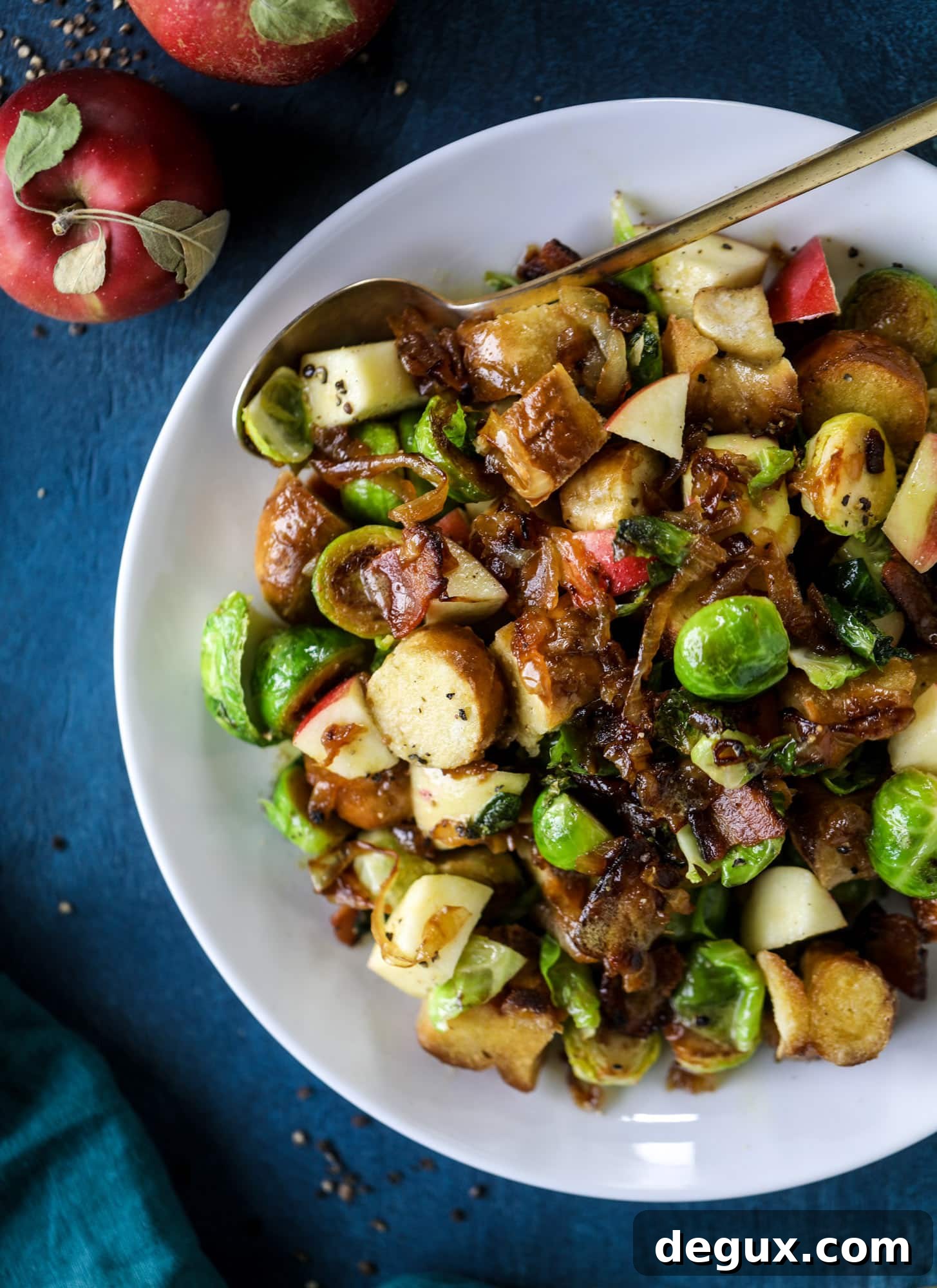 Warm Pretzel Panzanella with Tangy Mustard Vinaigrette 2 This soft pretzel panzanella with mustard vinaigrette is the best flavor combination for a fall salad there is! Crispy bacon, brussels sprouts, caramelized onion and chopped apple comes together to make for a satisfying delicious autumn salad. I howsweeteats.com #soft #pretzel #panzanella #mustard #apple #brusselssprouts