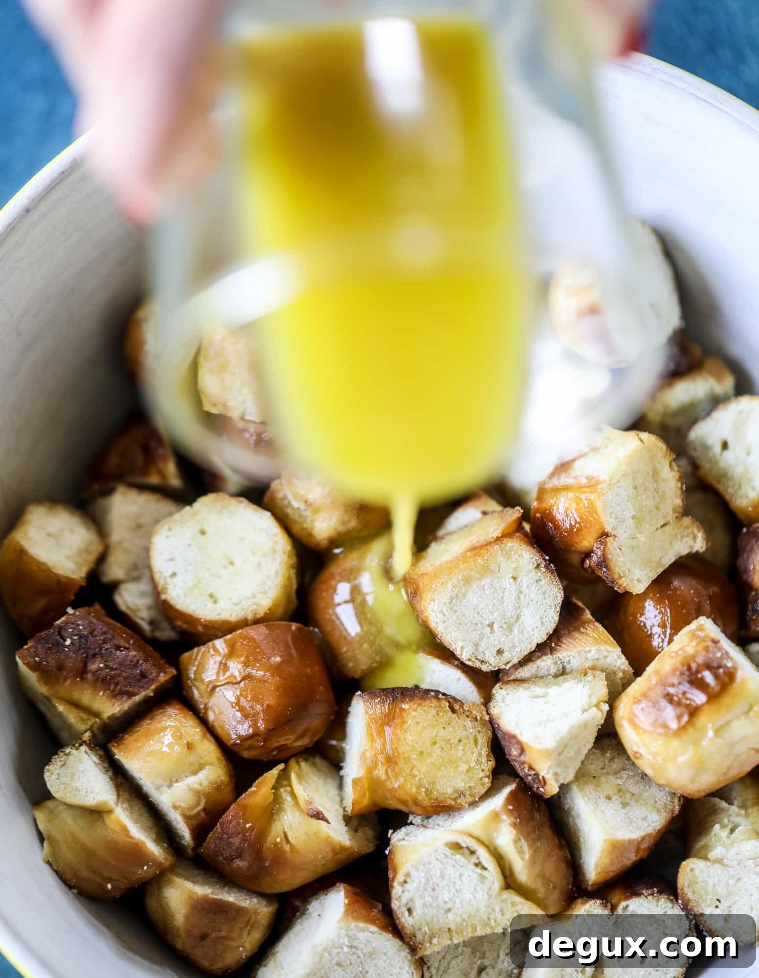 Warm Pretzel Panzanella with Tangy Mustard Vinaigrette 3 This soft pretzel panzanella with mustard vinaigrette is the best flavor combination for a fall salad there is! Crispy bacon, brussels sprouts, caramelized onion and chopped apple comes together to make for a satisfying delicious autumn salad. I howsweeteats.com #soft #pretzel #panzanella #mustard #apple #brusselssprouts