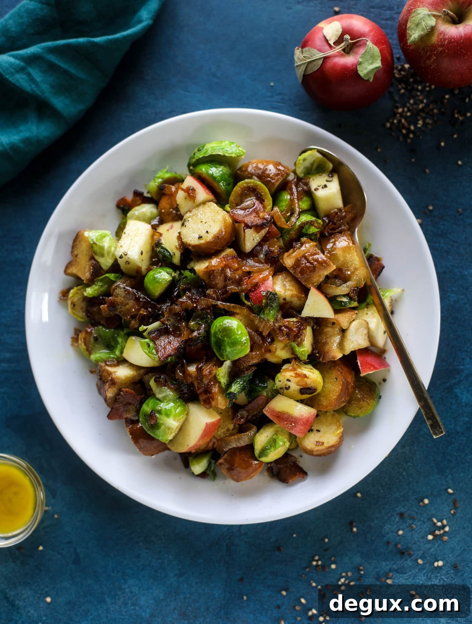 Warm Pretzel Panzanella with Tangy Mustard Vinaigrette 5 This soft pretzel panzanella with mustard vinaigrette is the best flavor combination for a fall salad there is! Crispy bacon, brussels sprouts, caramelized onion and chopped apple comes together to make for a satisfying delicious autumn salad. I howsweeteats.com #soft #pretzel #panzanella #mustard #apple #brusselssprouts