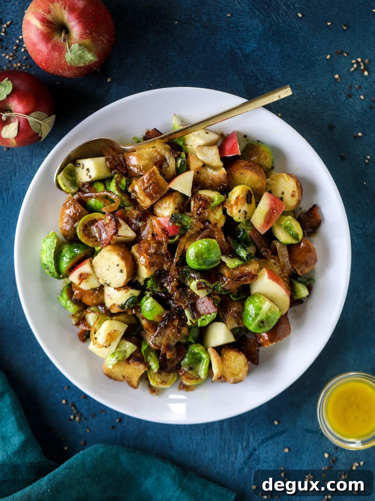 Warm Pretzel Panzanella with Tangy Mustard Vinaigrette 6 This soft pretzel panzanella with mustard vinaigrette is the best flavor combination for a fall salad there is! Crispy bacon, brussels sprouts, caramelized onion and chopped apple comes together to make for a satisfying delicious autumn salad. I howsweeteats.com #soft #pretzel #panzanella #mustard #apple #brusselssprouts