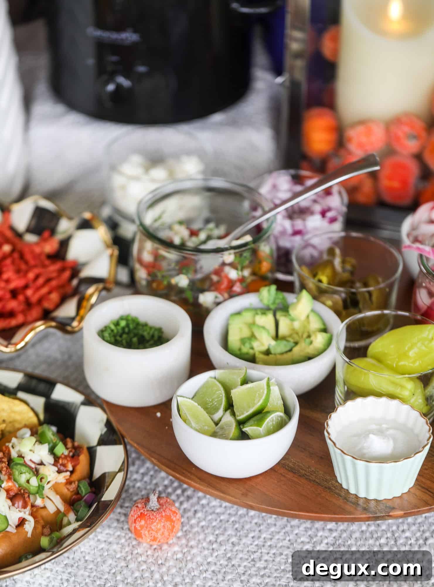 This is the best way to set up a chili bar! All my tips and tricks for setting up a perfect chili bar with multiple toppings, a nacho bar, hot dogs - all done with prep to make the day of the party super easy! This chili bar is goals. I howsweeteats.com #chili #bar #how #to