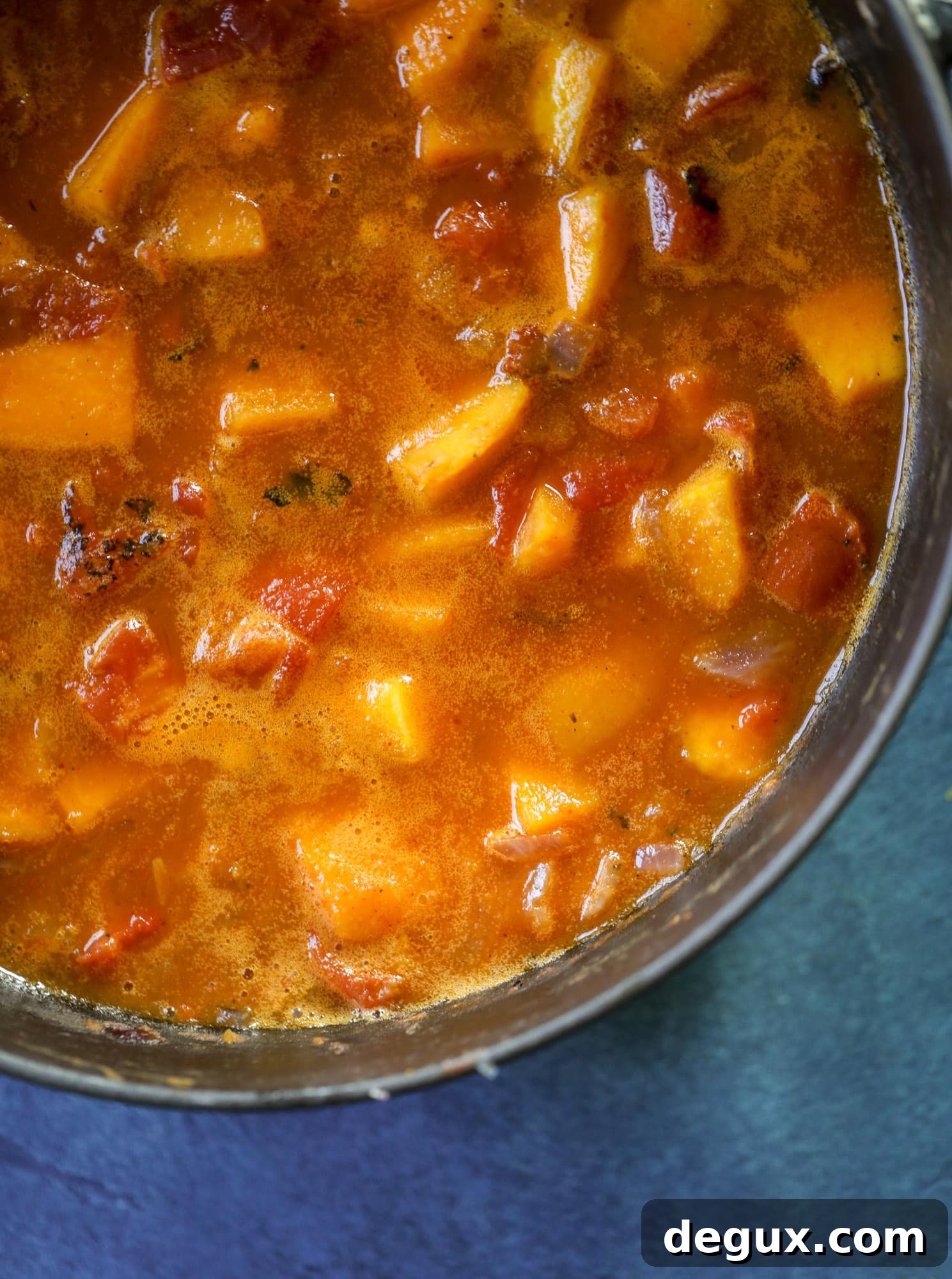 This butternut squash pasta sauce is heaven for an October dinner! Fire roasted tomatoes, butternut squash, pumpkin, sage, spice and parmesan all come together to create a delicious, simmered pot of sauce to blanket your favorite pasta!