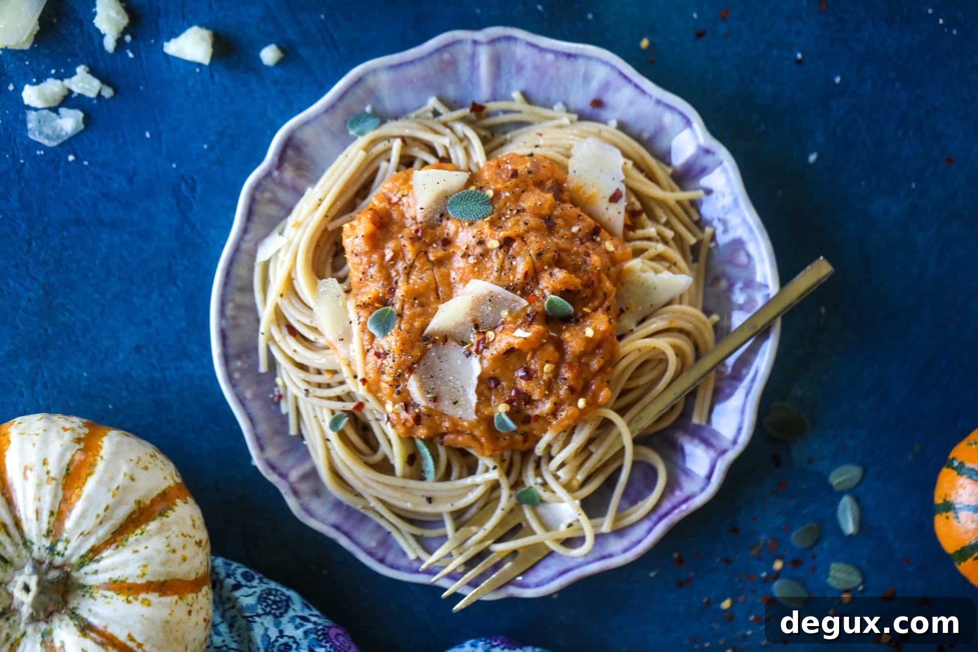 This butternut squash pasta sauce is heaven for an October dinner! Fire roasted tomatoes, butternut squash, pumpkin, sage, spice and parmesan all come together to create a delicious, simmered pot of sauce to blanket your favorite pasta!
