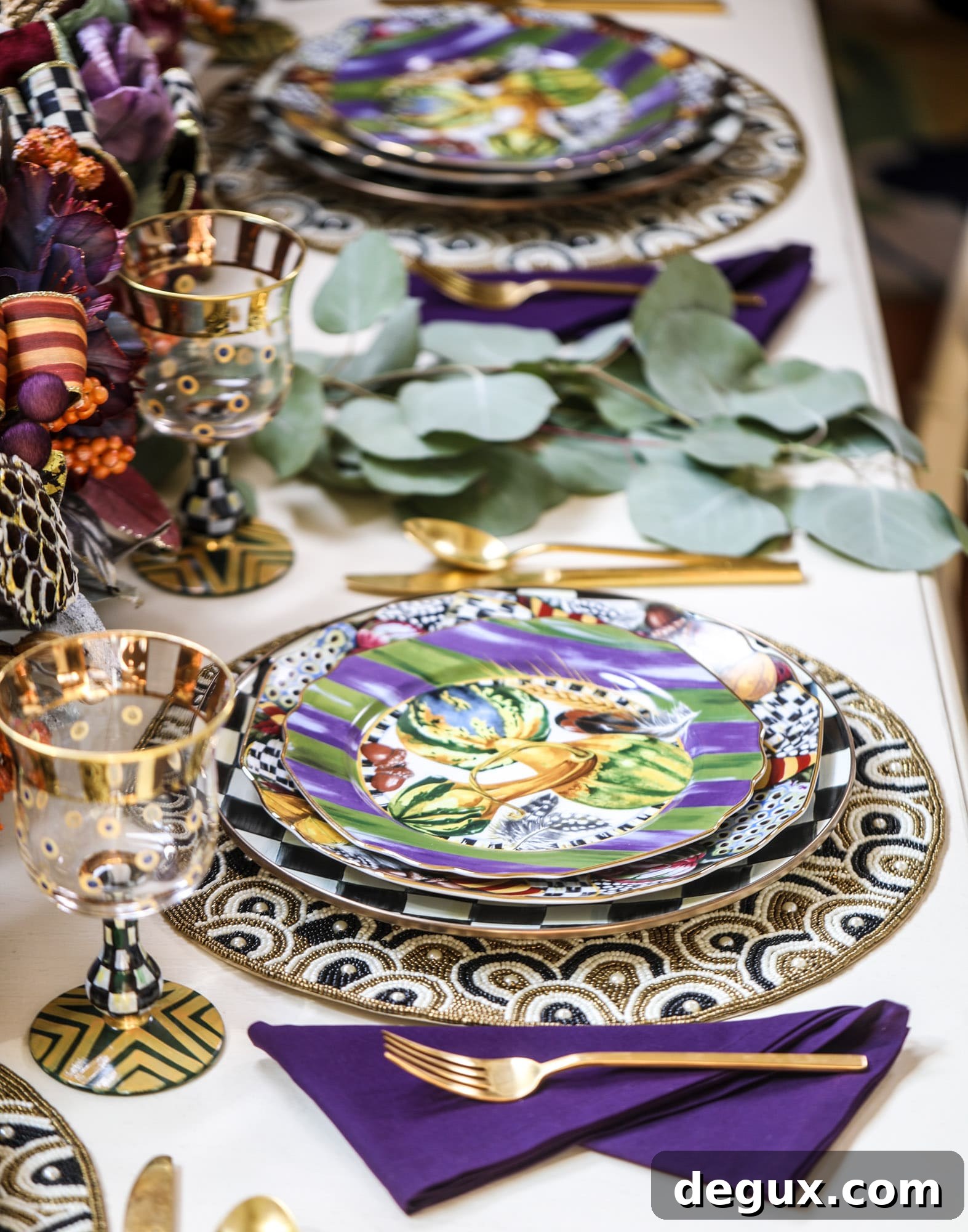 Table setting with pheasant run dinner plates and courtly check chargers