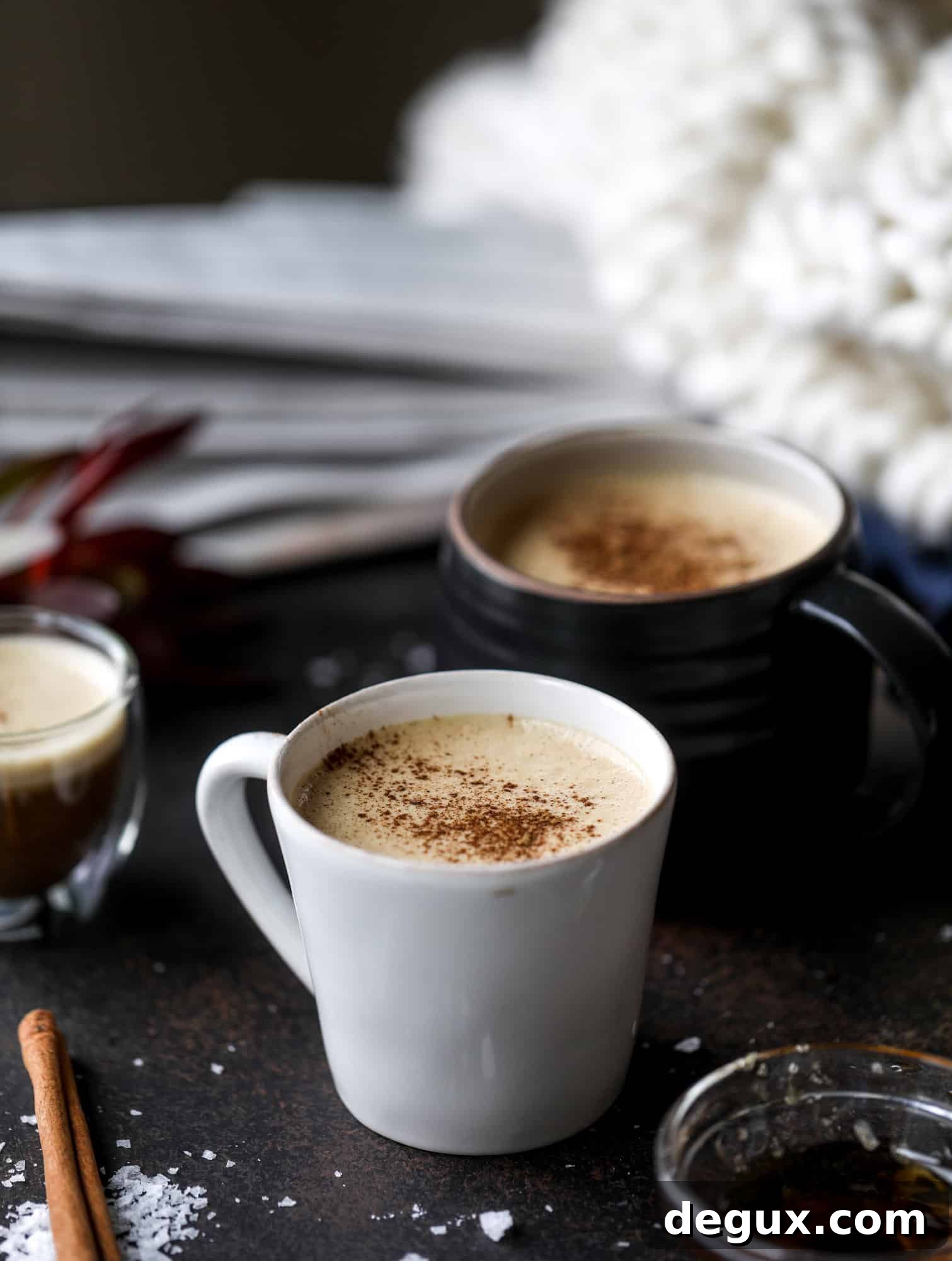 This salted maple power coffee is the perfect creamy pick-me up. Maple syrup, coconut butter and sea salt are blended with hot coffee to make the most deliciously whipped hot, frothy latte-like drink, without any dairy! I howsweeteats.com #coffee #coconutbutter