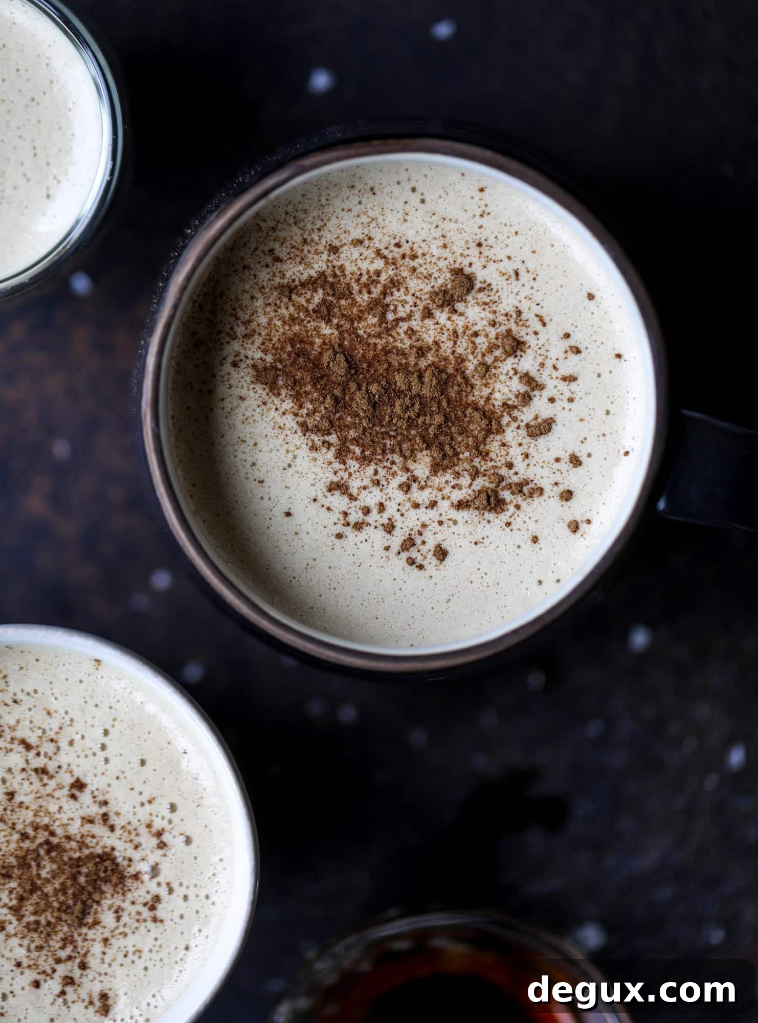 This salted maple power coffee is the perfect creamy pick-me up. Maple syrup, coconut butter and sea salt are blended with hot coffee to make the most deliciously whipped hot, frothy latte-like drink, without any dairy! I howsweeteats.com #coffee #coconutbutter