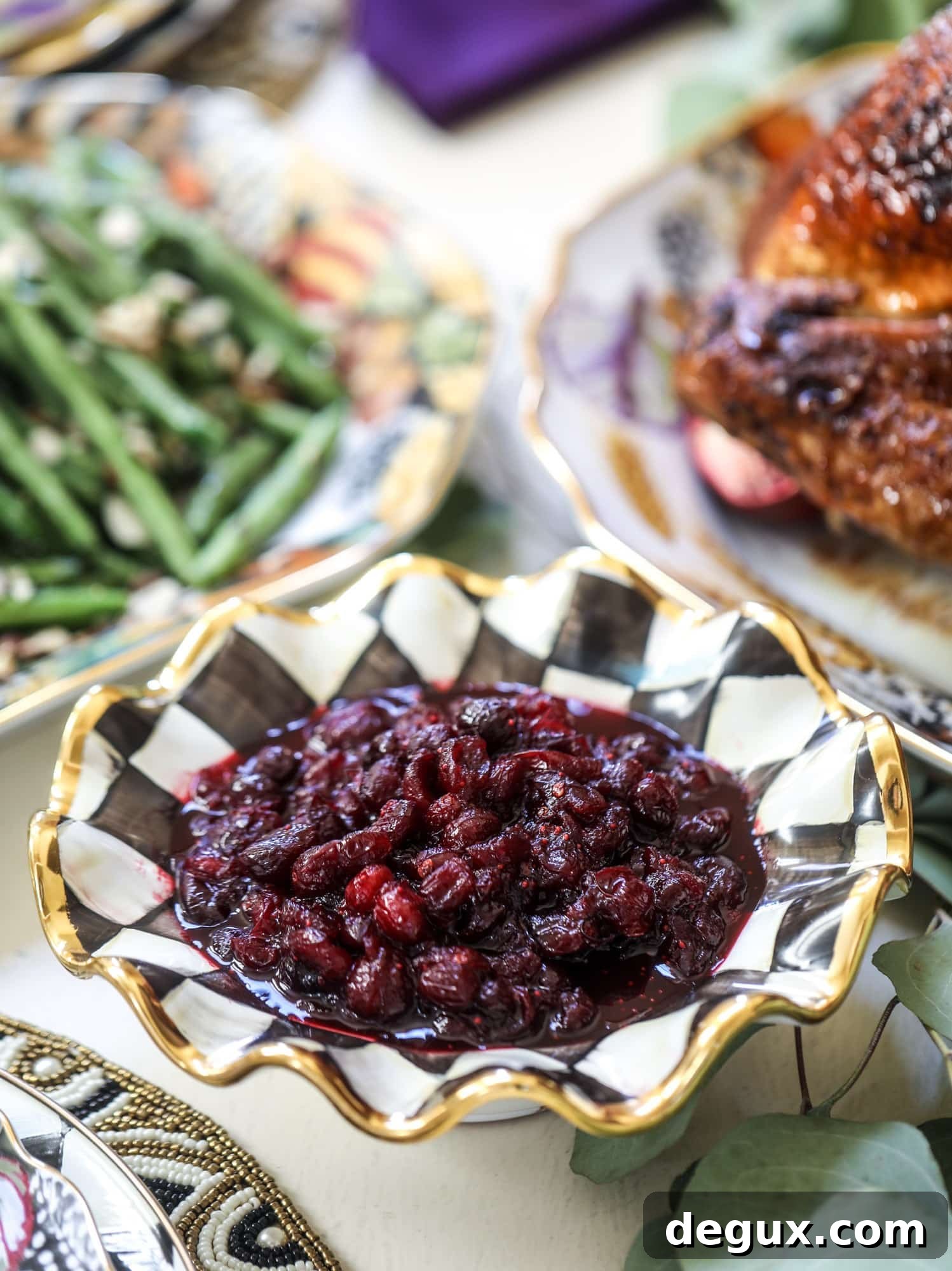 This cranberry chutney is not your traditional Thanksgiving side dish! Chipotle peppers and adobo sauce give this cranberry chutney a little kick - a touch of heat that works so well with the sweet. As a side or spread on sandwiches, it's perfect for the holidays! I howsweeteats.com #cranberry #chutney