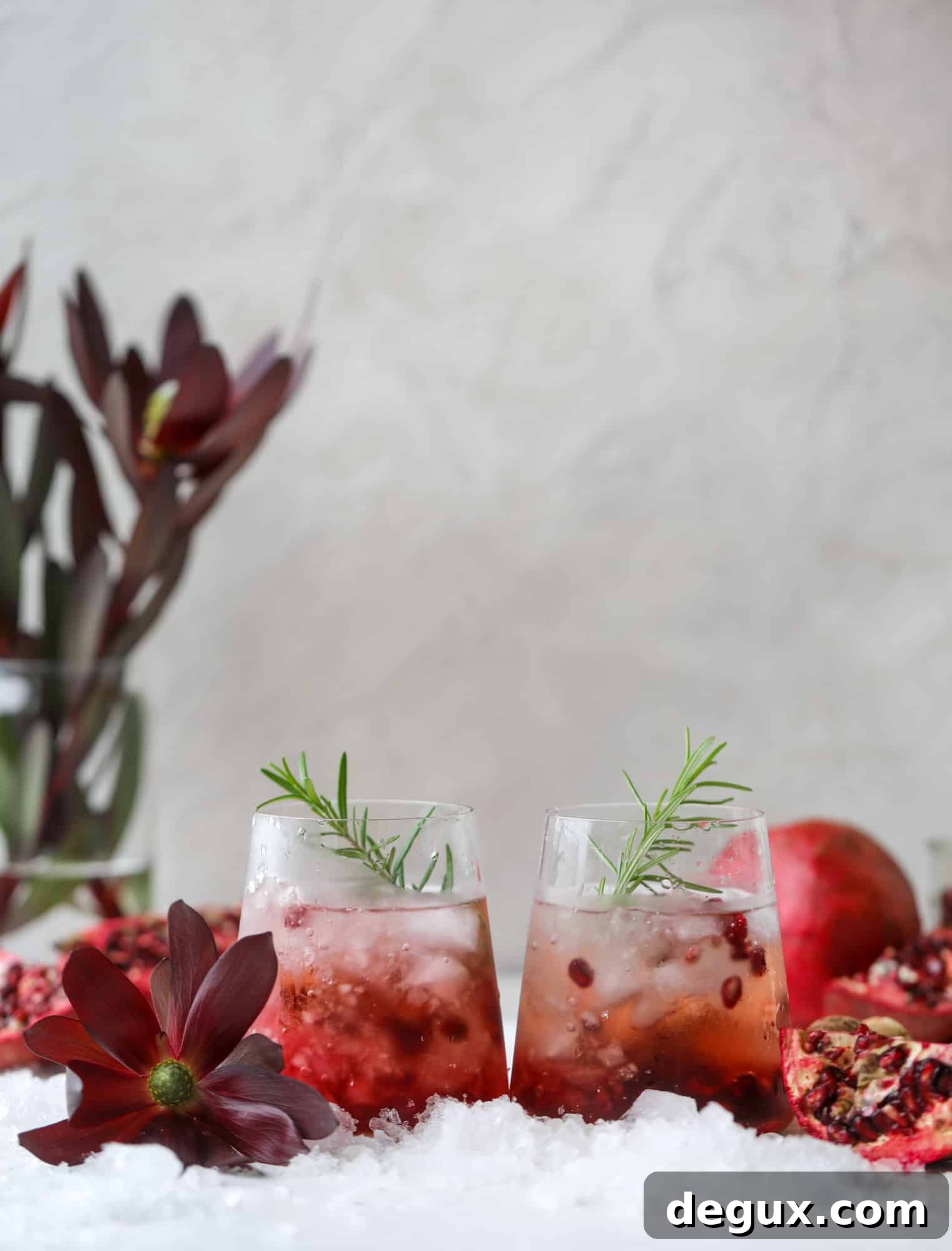 Pomegranate Prosecco Smash: 8 Thanksgiving Cocktails to Try 5 Pomegranate prosecco smash garnished with rosemary and arils