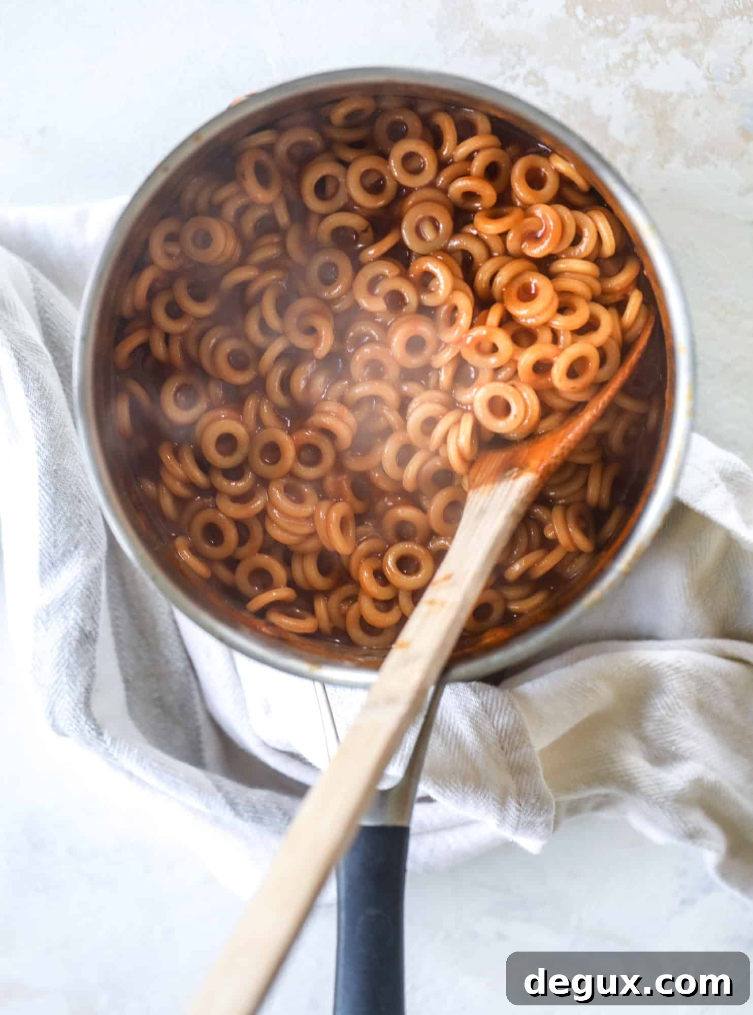 These homemade spaghettios are the ultimate comfort food! They come together in less than 30 minutes, are super easy and flavorful and topped with crispy crunchy manchego cheese that takes the taste over the top!