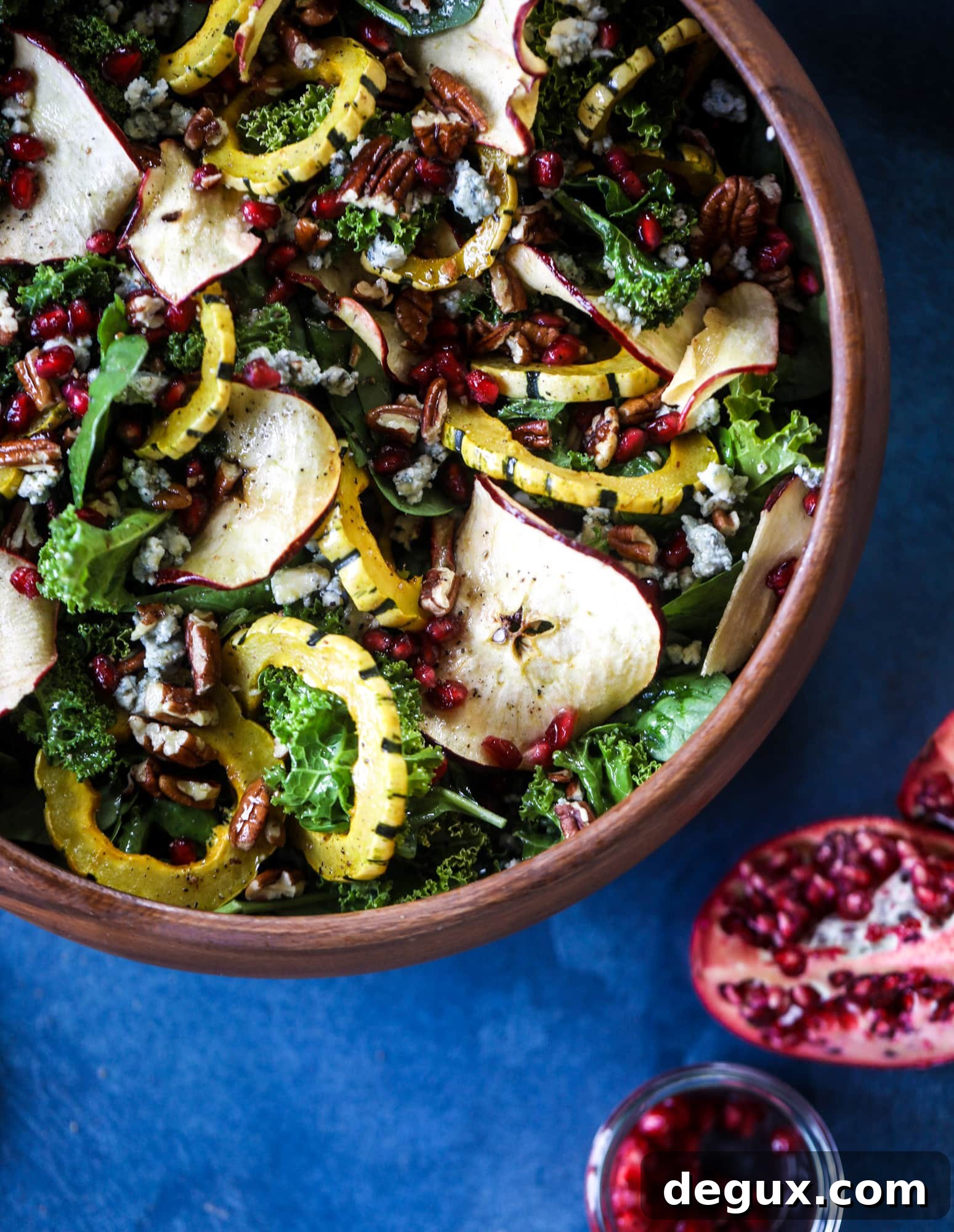 Thanksgiving Kale Salad with Cranberry-Cinnamon Vinaigrette 4 This thanksgiving salad is full of so much autumn flavor. It has toasted pomegranate, delicata squash, toasted pecans, creamy blue cheese and crunchy apple chips. It's light enough to serve before the big meal! I howsweeteats.com #thanksgiving #salad