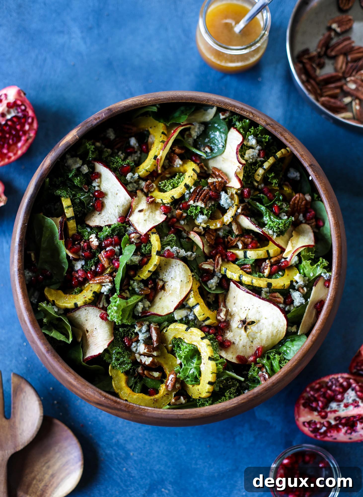 Thanksgiving Kale Salad with Cranberry-Cinnamon Vinaigrette 5 This thanksgiving salad is full of so much autumn flavor. It has toasted pomegranate, delicata squash, toasted pecans, creamy blue cheese and crunchy apple chips. It's light enough to serve before the big meal! I howsweeteats.com #thanksgiving #salad