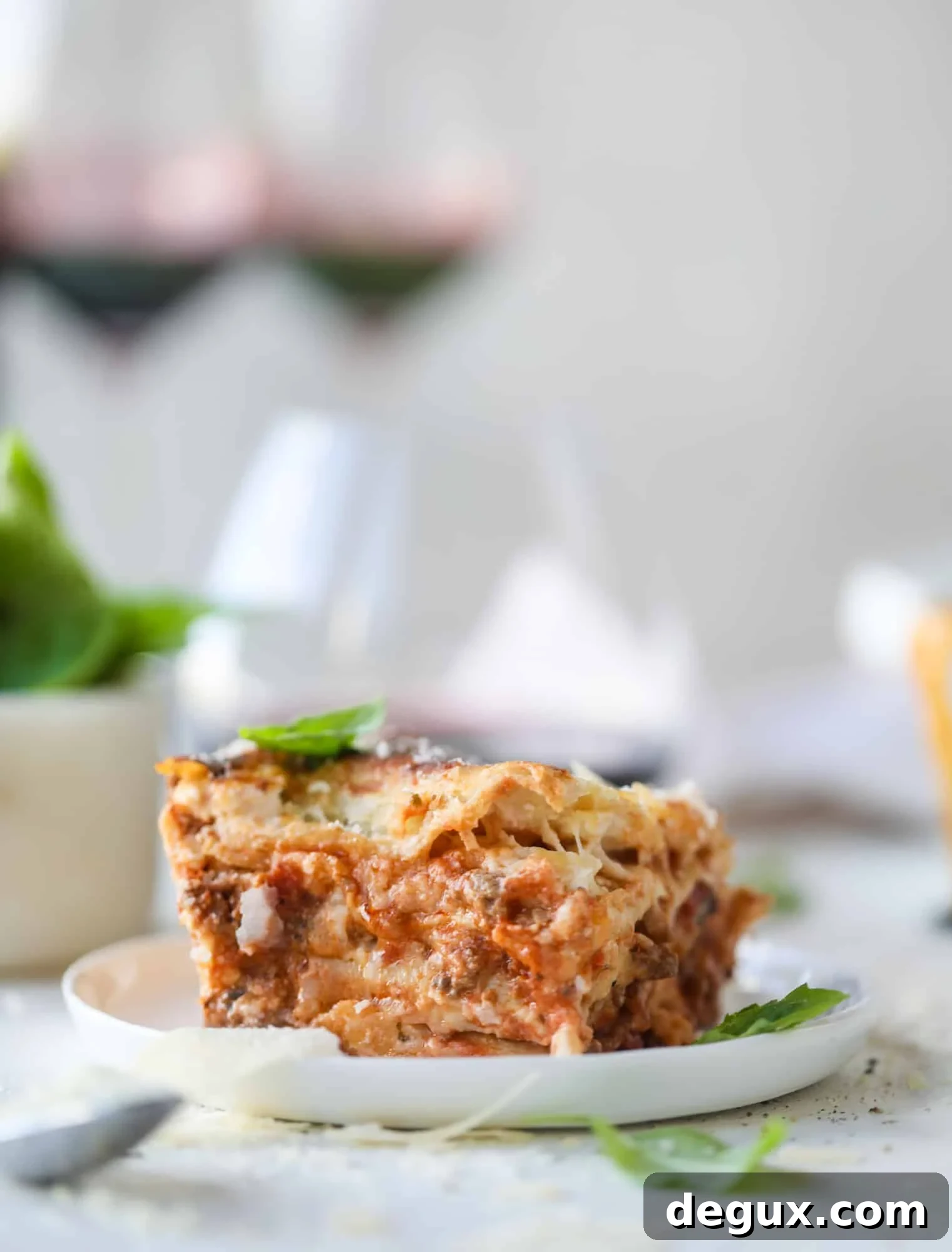 This lasagna bolognese is the ultimate comfort food. Meaty sauce, whole wheat lasagna noodles, creamy bechamel and grated cheese come together to create the most perfect slice of lasagna heaven!