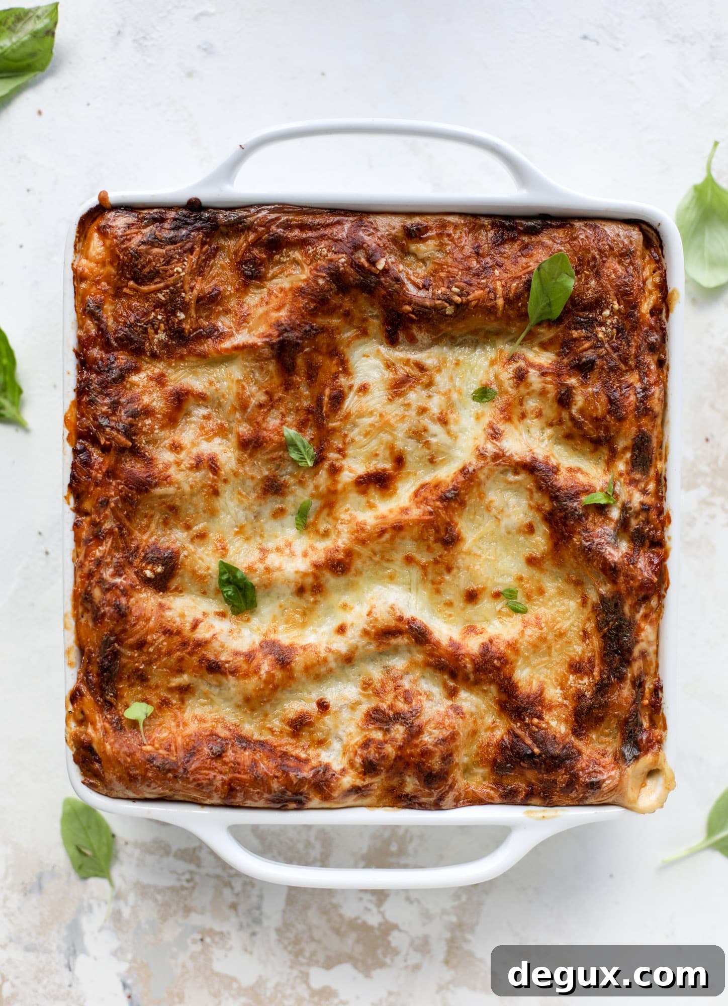 This lasagna bolognese is the ultimate comfort food. Meaty sauce, whole wheat lasagna noodles, creamy bechamel and grated cheese come together to create the most perfect slice of lasagna heaven!