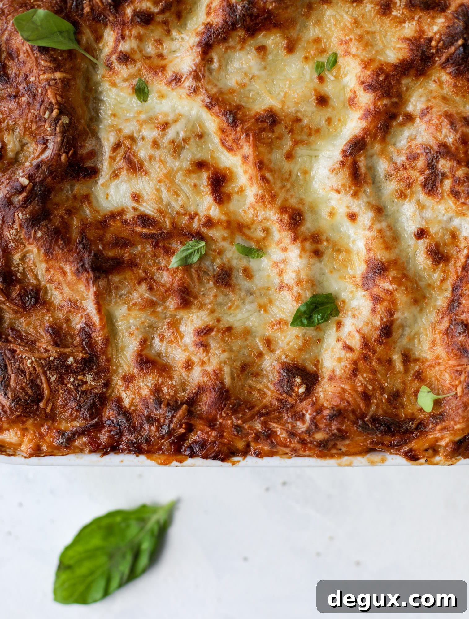 This lasagna bolognese is the ultimate comfort food. Meaty sauce, whole wheat lasagna noodles, creamy bechamel and grated cheese come together to create the most perfect slice of lasagna heaven!