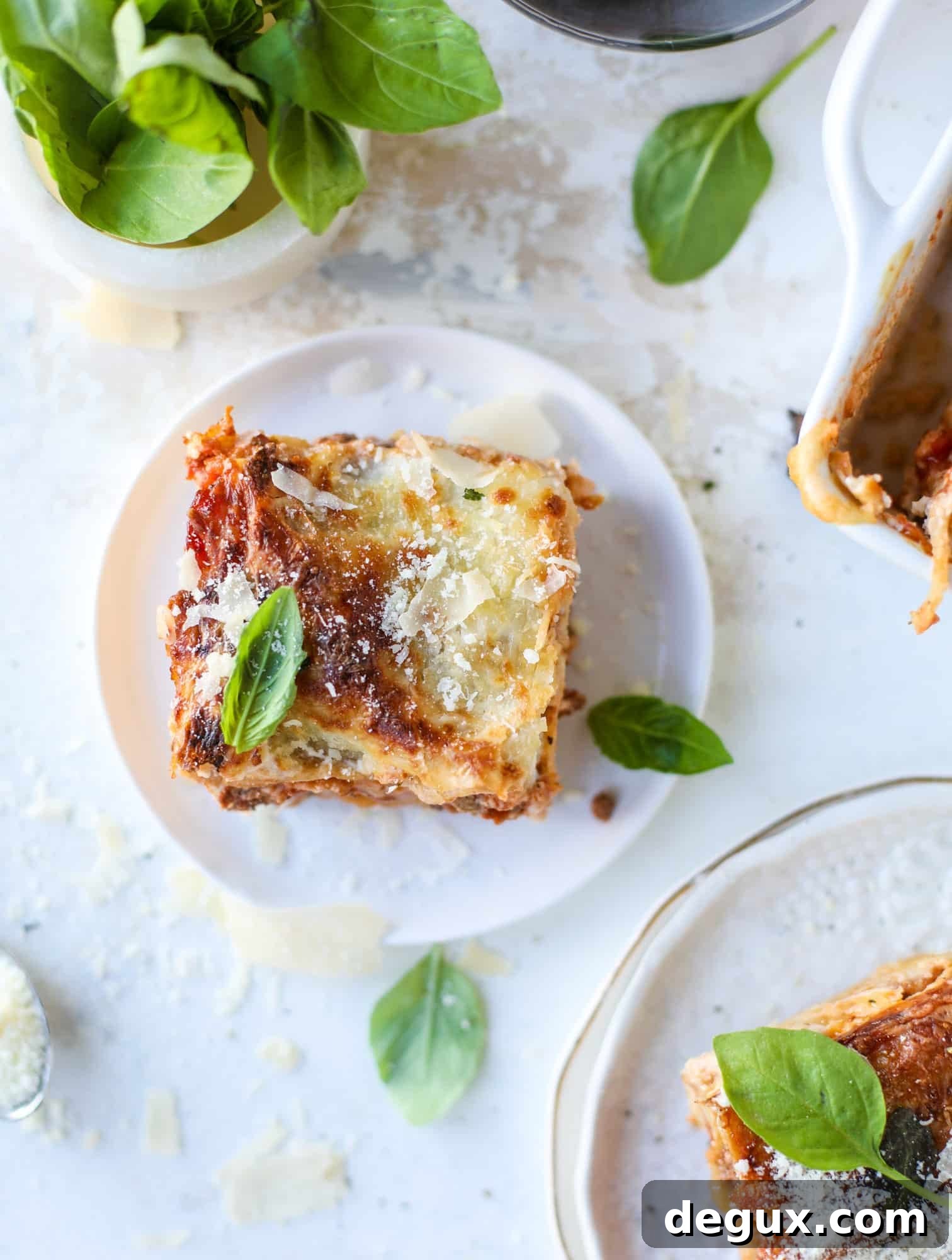 This lasagna bolognese is the ultimate comfort food. Meaty sauce, whole wheat lasagna noodles, creamy bechamel and grated cheese come together to create the most perfect slice of lasagna heaven!