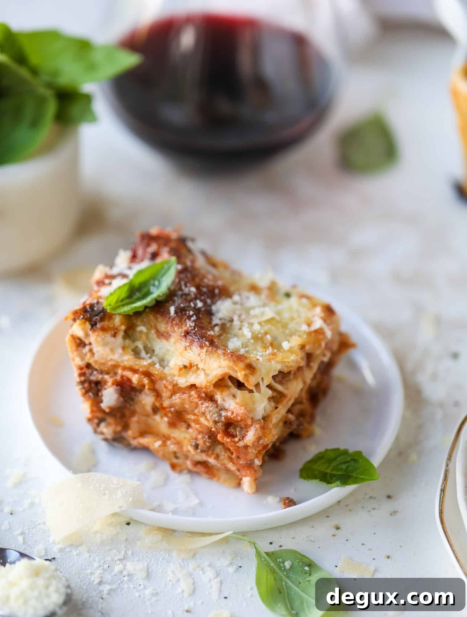 This lasagna bolognese is the ultimate comfort food. Meaty sauce, whole wheat lasagna noodles, creamy bechamel and grated cheese come together to create the most perfect slice of lasagna heaven!