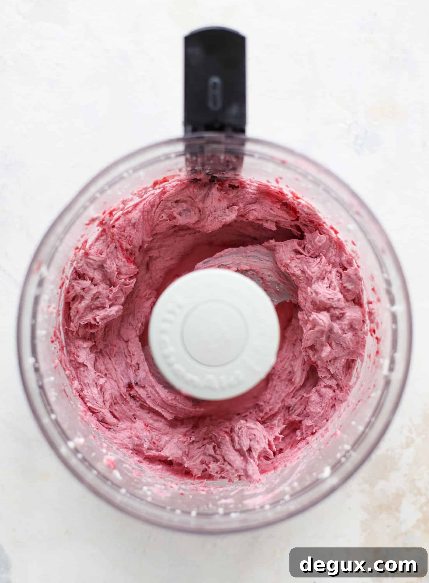 This whipped cranberry goat cheese spread is the perfect holiday appetizer! You can make it ahead of time and serve it with a cheese board or bread and crackers - before or during the meal! Plus it's super pretty too! I howsweeteats.com #cranberry #goatcheese