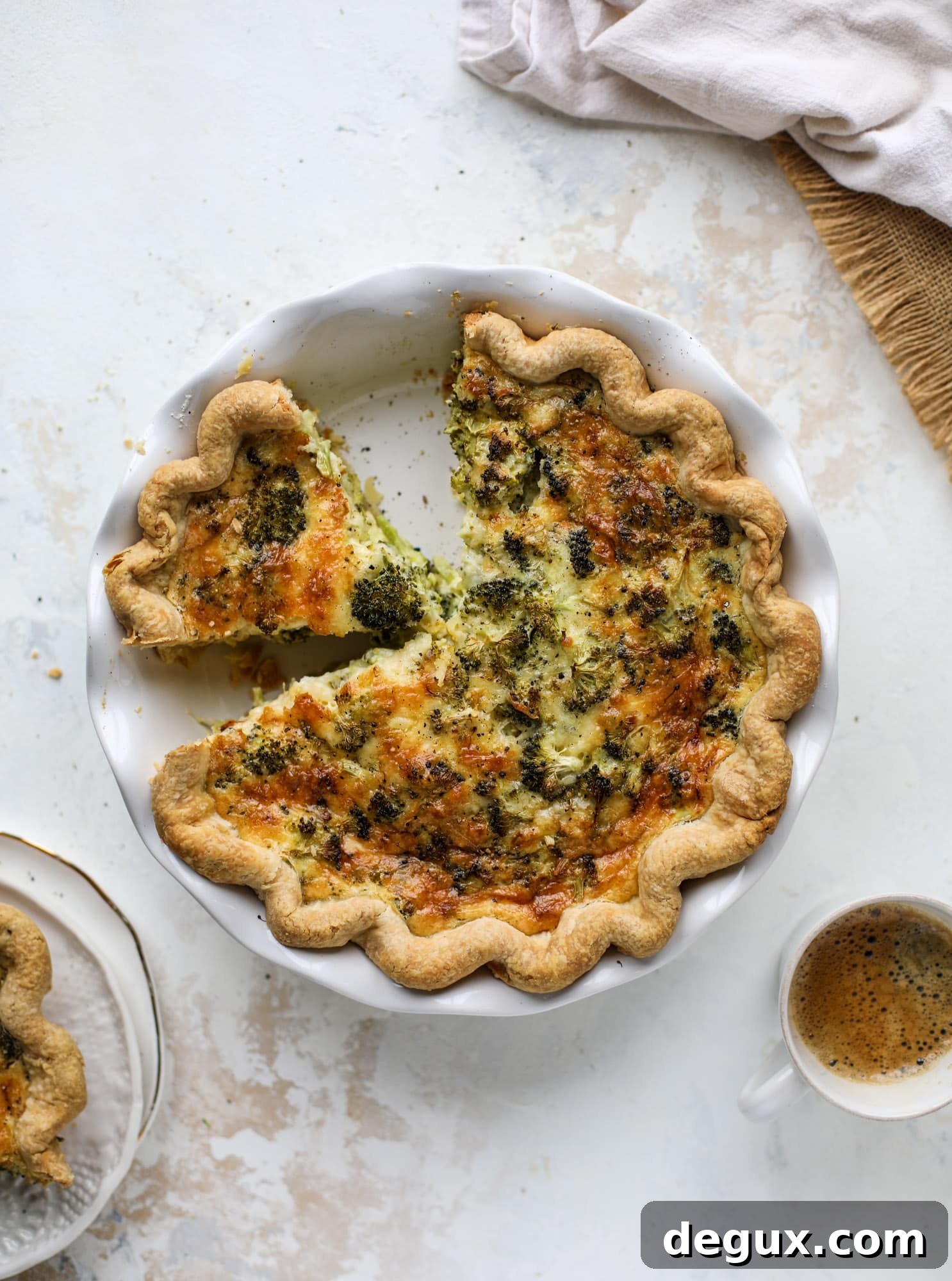 Broccoli Cheddar Quiche Recipe: Flaky Crust and Creamy Filling 2 This broccoli cheese quiche is absolutely perfect for brunch, lunch or even dinner! It's delicious served warm or cold, perfect paired with a greens salad and is a recipe that can be made ahead of time! I howsweeteats.com #broccolicheese #quiche