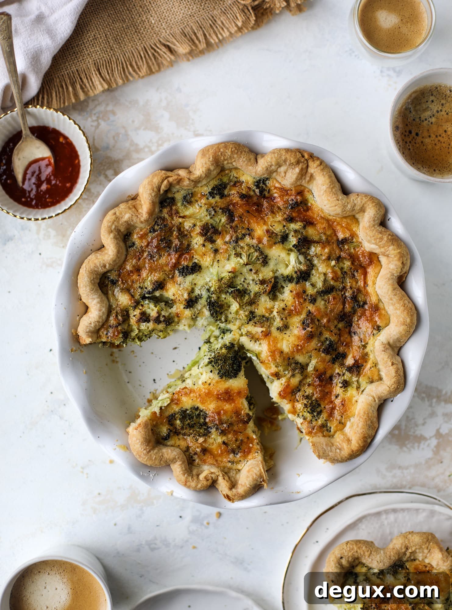 Broccoli Cheddar Quiche Recipe: Flaky Crust and Creamy Filling 9 This broccoli cheese quiche is absolutely perfect for brunch, lunch or even dinner! It's delicious served warm or cold, perfect paired with a greens salad and is a recipe that can be made ahead of time! I howsweeteats.com #broccolicheese #quiche