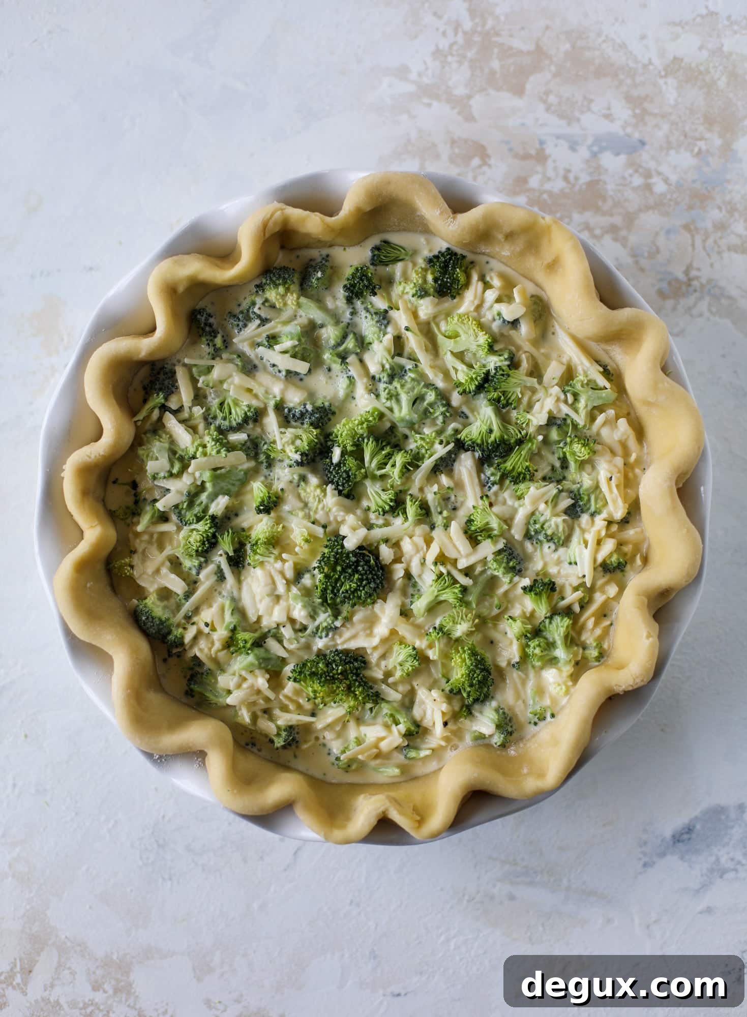Broccoli Cheddar Quiche Recipe: Flaky Crust and Creamy Filling 5 This broccoli cheese quiche is absolutely perfect for brunch, lunch or even dinner! It's delicious served warm or cold, perfect paired with a greens salad and is a recipe that can be made ahead of time! I howsweeteats.com #broccolicheese #quiche