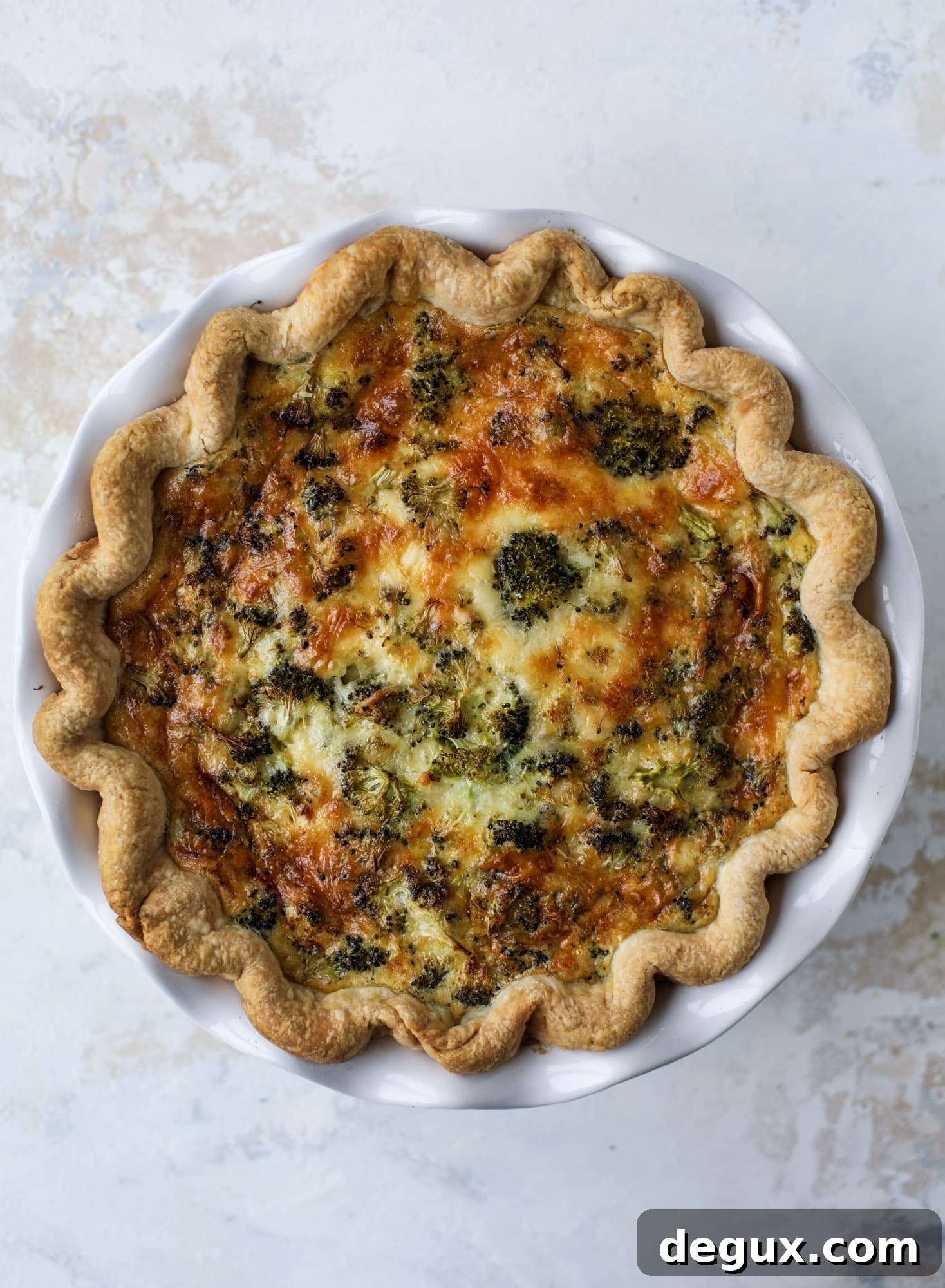 Broccoli Cheddar Quiche Recipe: Flaky Crust and Creamy Filling 6 This broccoli cheese quiche is absolutely perfect for brunch, lunch or even dinner! It's delicious served warm or cold, perfect paired with a greens salad and is a recipe that can be made ahead of time! I howsweeteats.com #broccolicheese #quiche