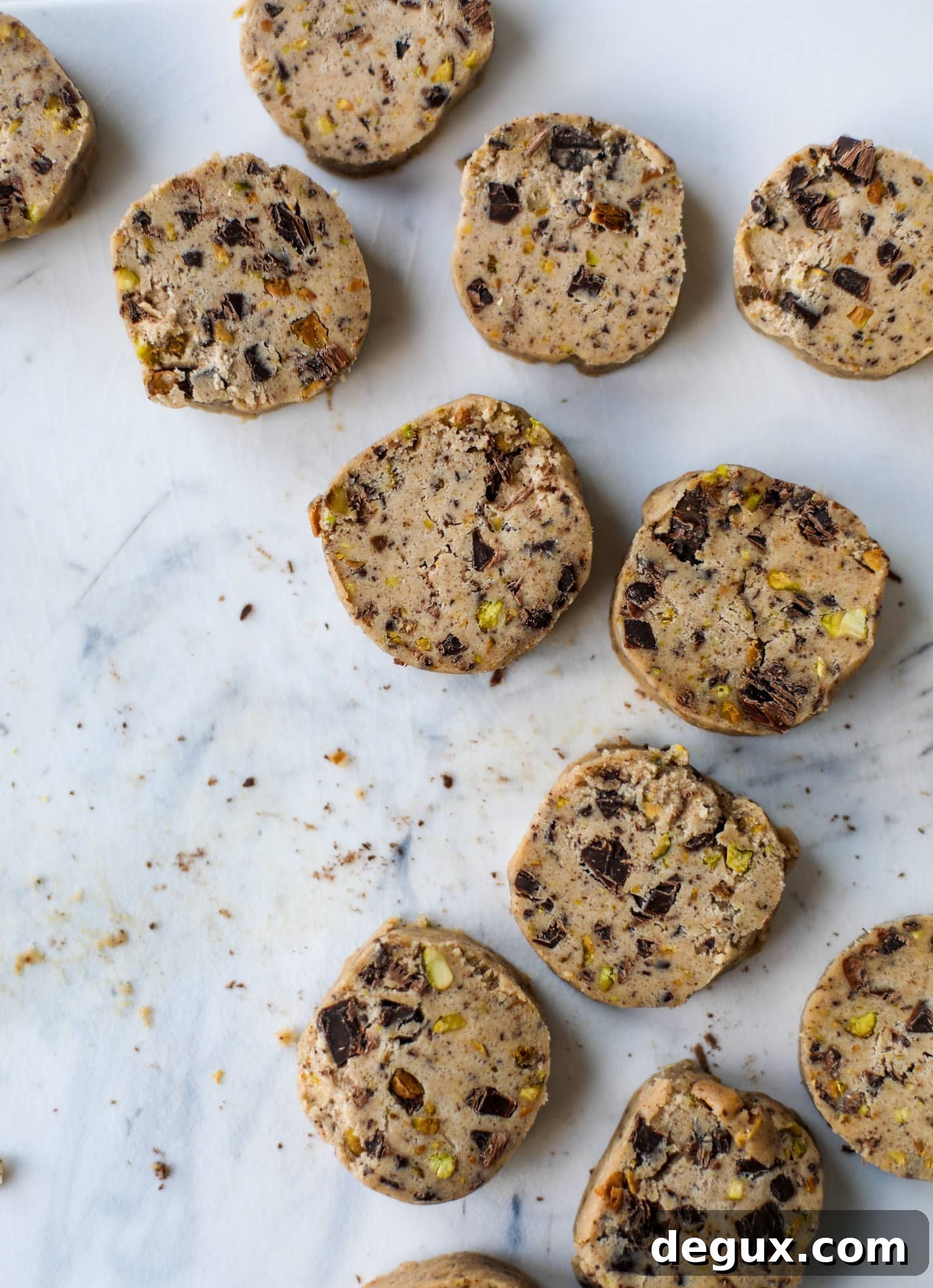 Brown Butter Pistachio Chocolate Chunk Shortbread Cookies 4 This chocolate pistachio shortbread recipe is the perfect combo of sweet and salty in a crunchy cookie! Melty, rich dark chocolate comes together with roasted, salted pistachios to make a delicious crunchy cookie! I howsweeteats.com #chocolate #pistachio #shortbread