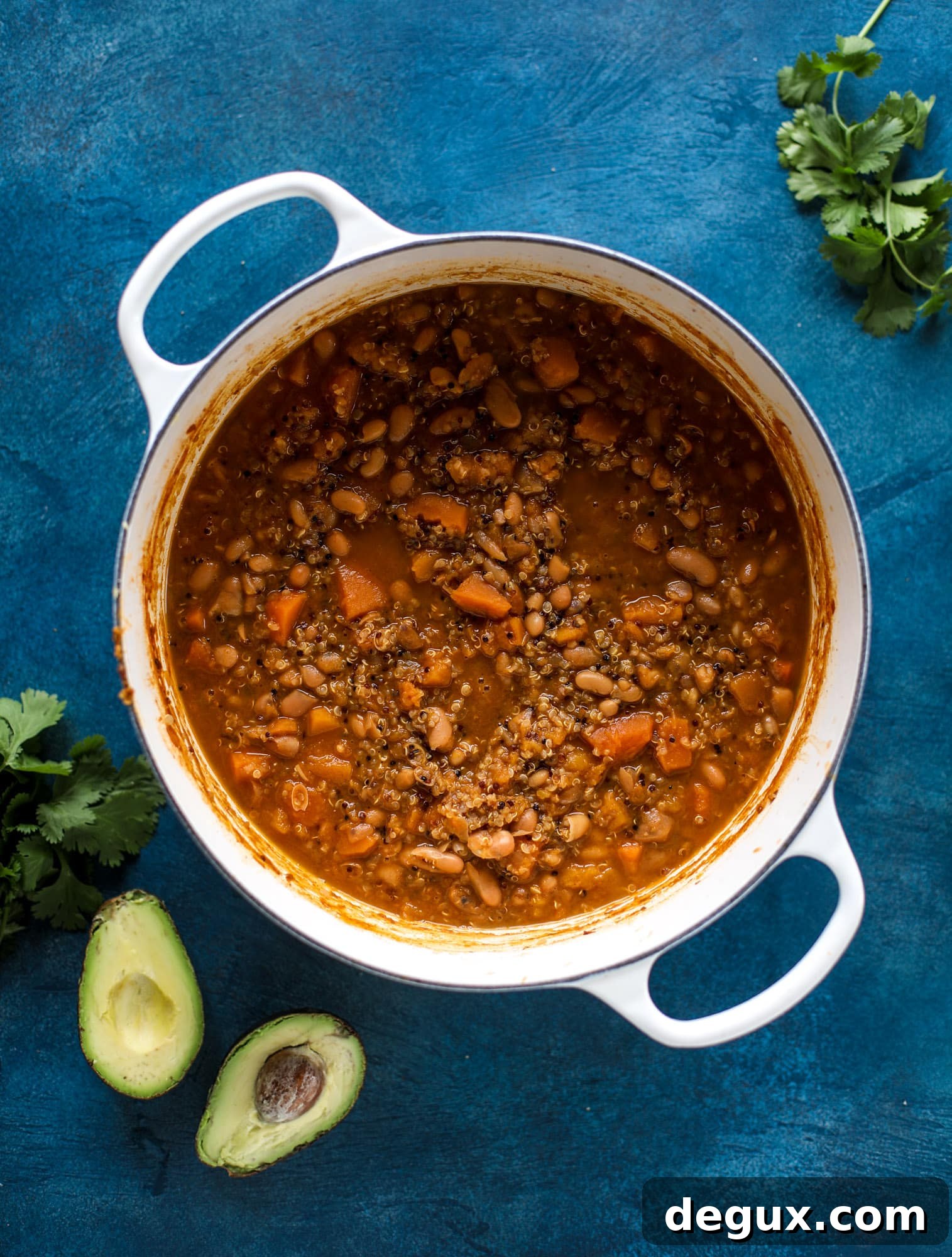 Hearty Butternut Squash and Quinoa Chili Recipe 3 This butternut squash chili is super satisfying and delicious! It's made with pinto beans and quinoa, comes together quickly and is filling and perfect to reheat for lunches. Everything you want in a vegetarian chili!