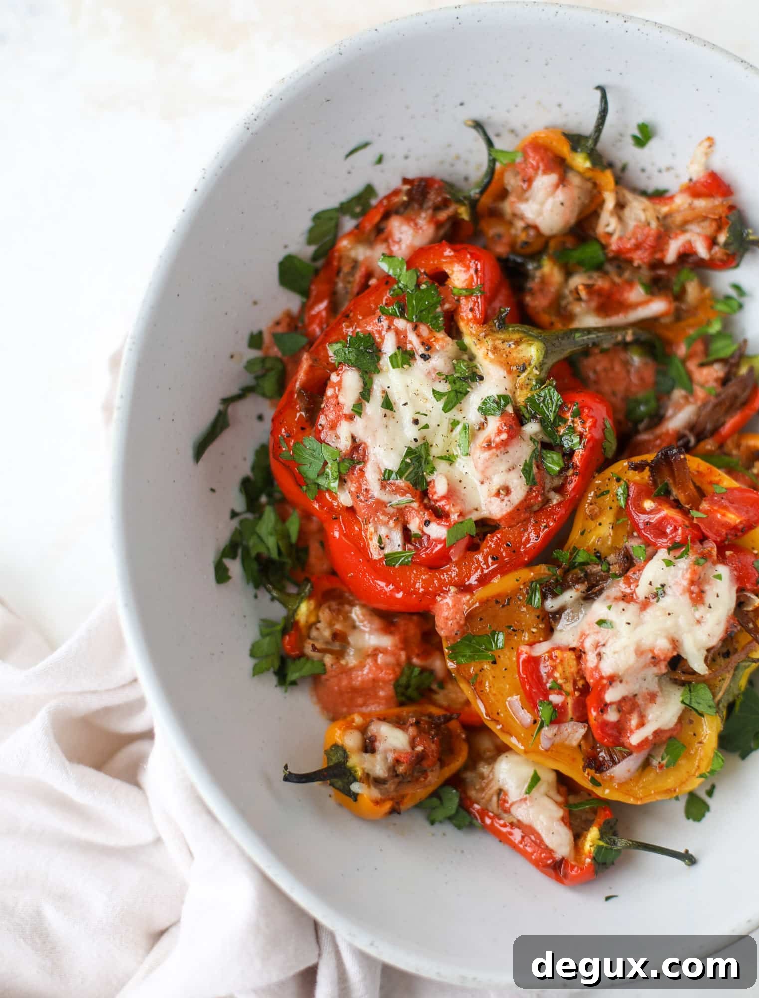 Fire-Roasted Pulled Pork Stuffed Peppers Recipe 2 These pulled pork stuffed peppers are a delicious dinner idea for any weeknight! They work great with leftover pulled pork and the filling is totally customizable. They are flavorful, come together quickly and always a crowd pleaser! I howsweeteats.com #pulledpork #stuffedpeppers