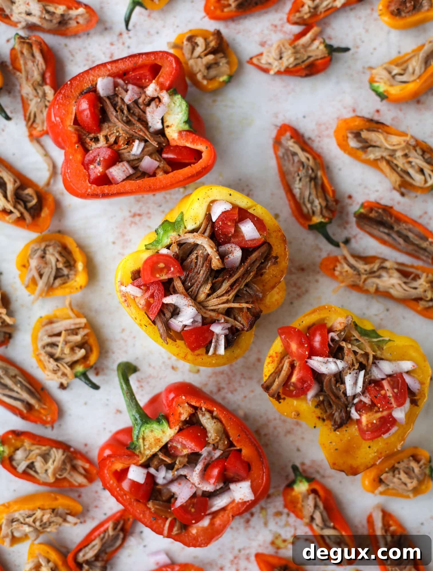 Fire-Roasted Pulled Pork Stuffed Peppers Recipe 3 These pulled pork stuffed peppers are a delicious dinner idea for any weeknight! They work great with leftover pulled pork and the filling is totally customizable. They are flavorful, come together quickly and always a crowd pleaser! I howsweeteats.com #pulledpork #stuffedpeppers