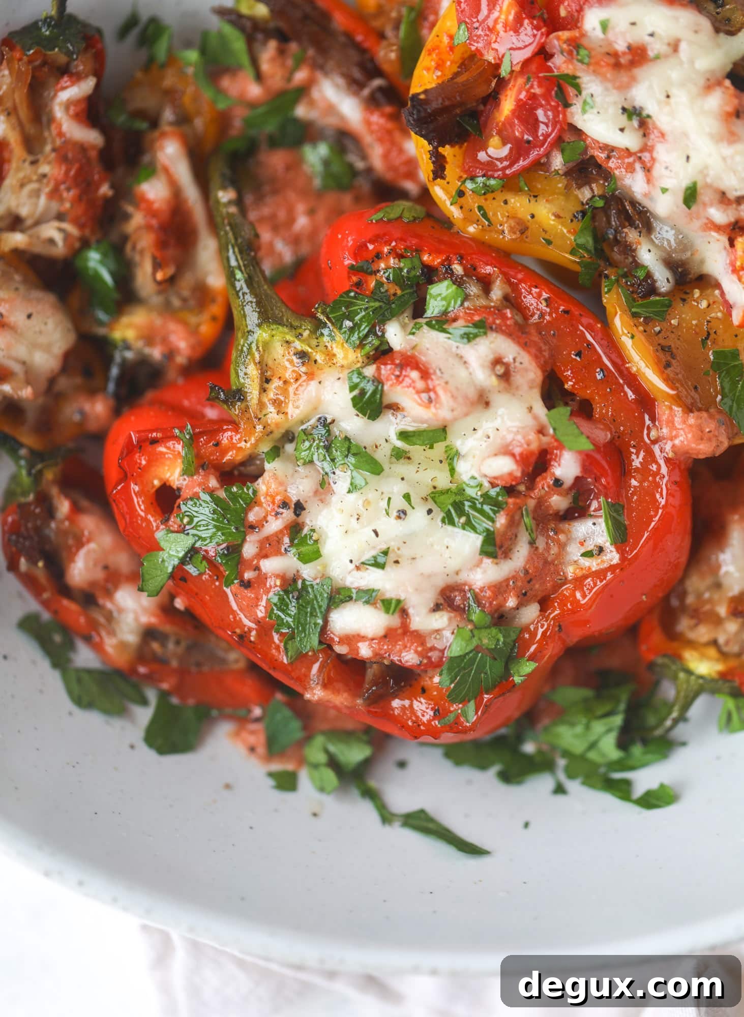 Fire-Roasted Pulled Pork Stuffed Peppers Recipe 7 These pulled pork stuffed peppers are a delicious dinner idea for any weeknight! They work great with leftover pulled pork and the filling is totally customizable. They are flavorful, come together quickly and always a crowd pleaser! I howsweeteats.com #pulledpork #stuffedpeppers