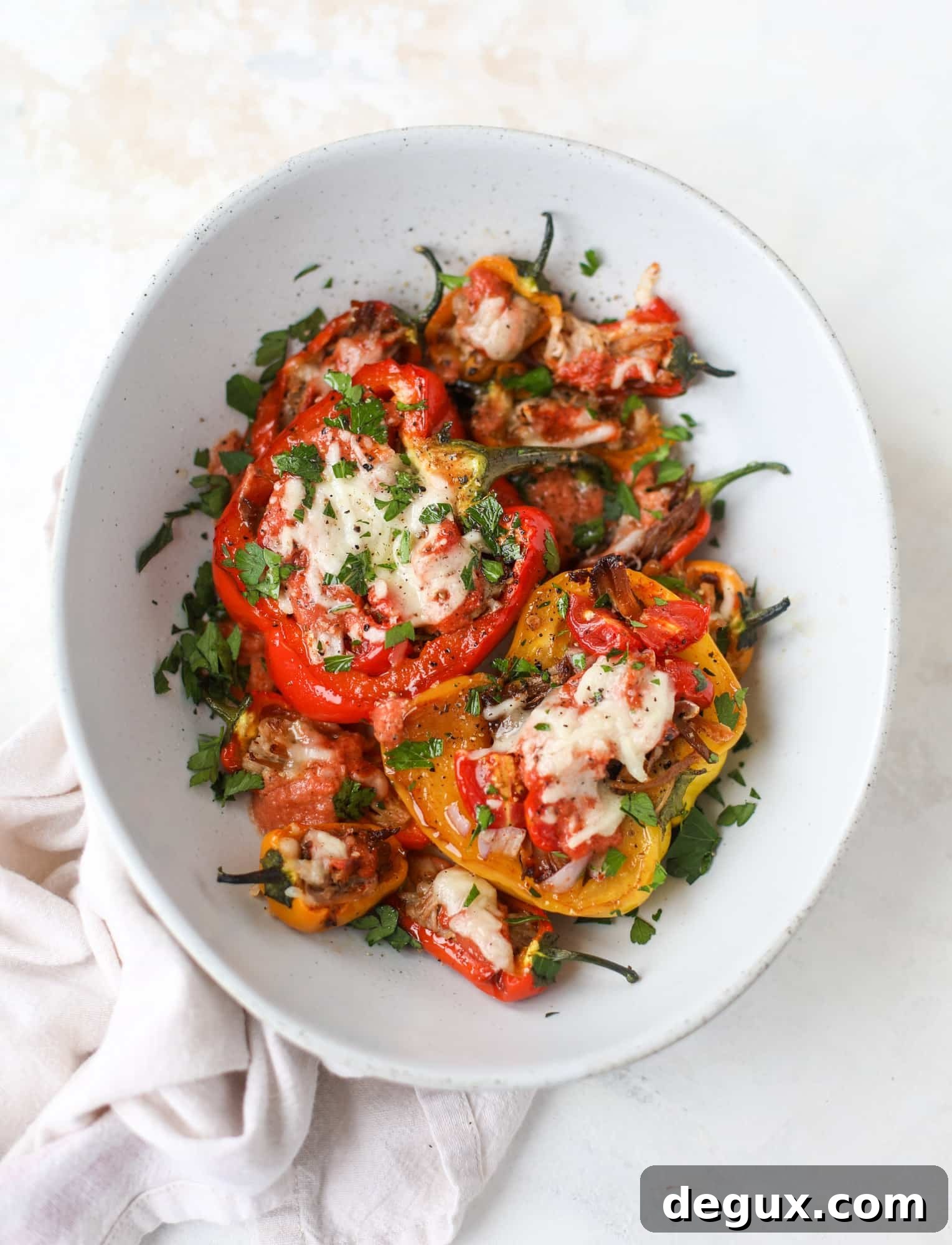 Fire-Roasted Pulled Pork Stuffed Peppers Recipe 8 These pulled pork stuffed peppers are a delicious dinner idea for any weeknight! They work great with leftover pulled pork and the filling is totally customizable. They are flavorful, come together quickly and always a crowd pleaser! I howsweeteats.com #pulledpork #stuffedpeppers